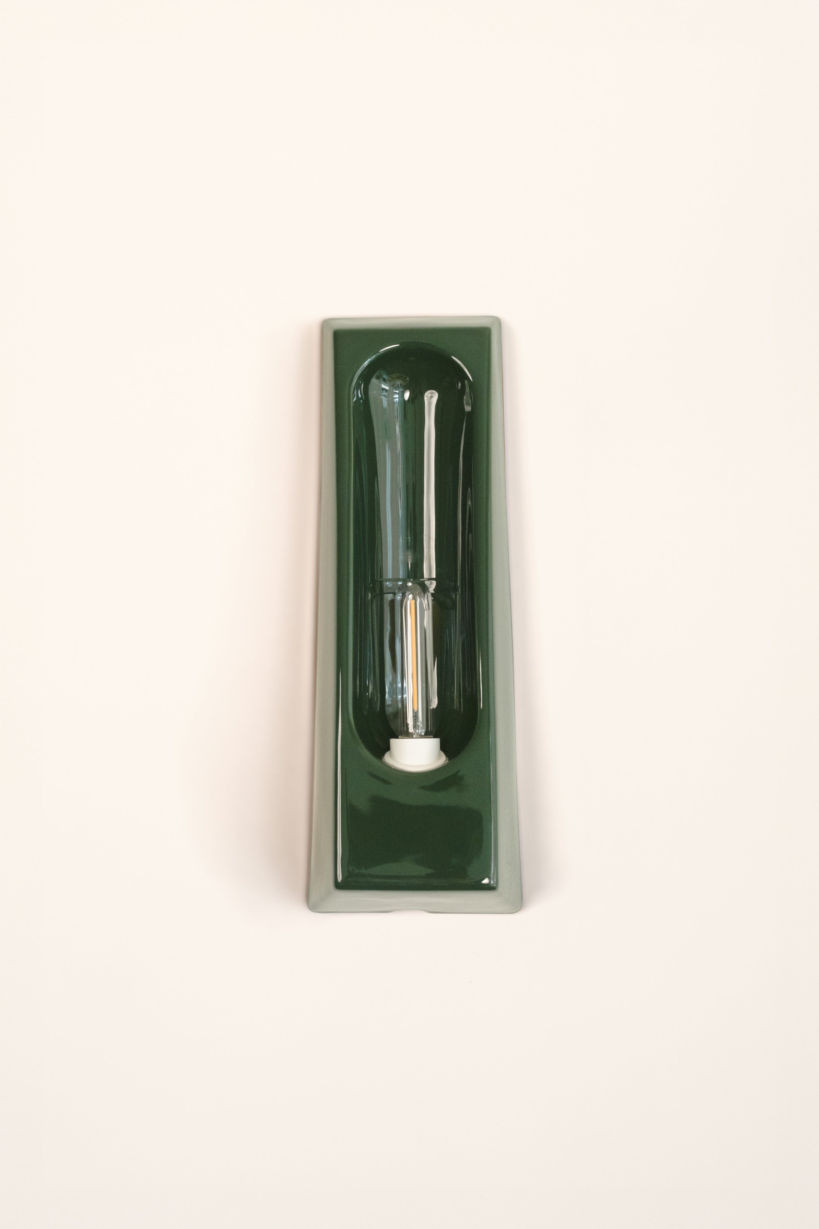 Alcove Verde — side angle showing glossy green ceramic finish