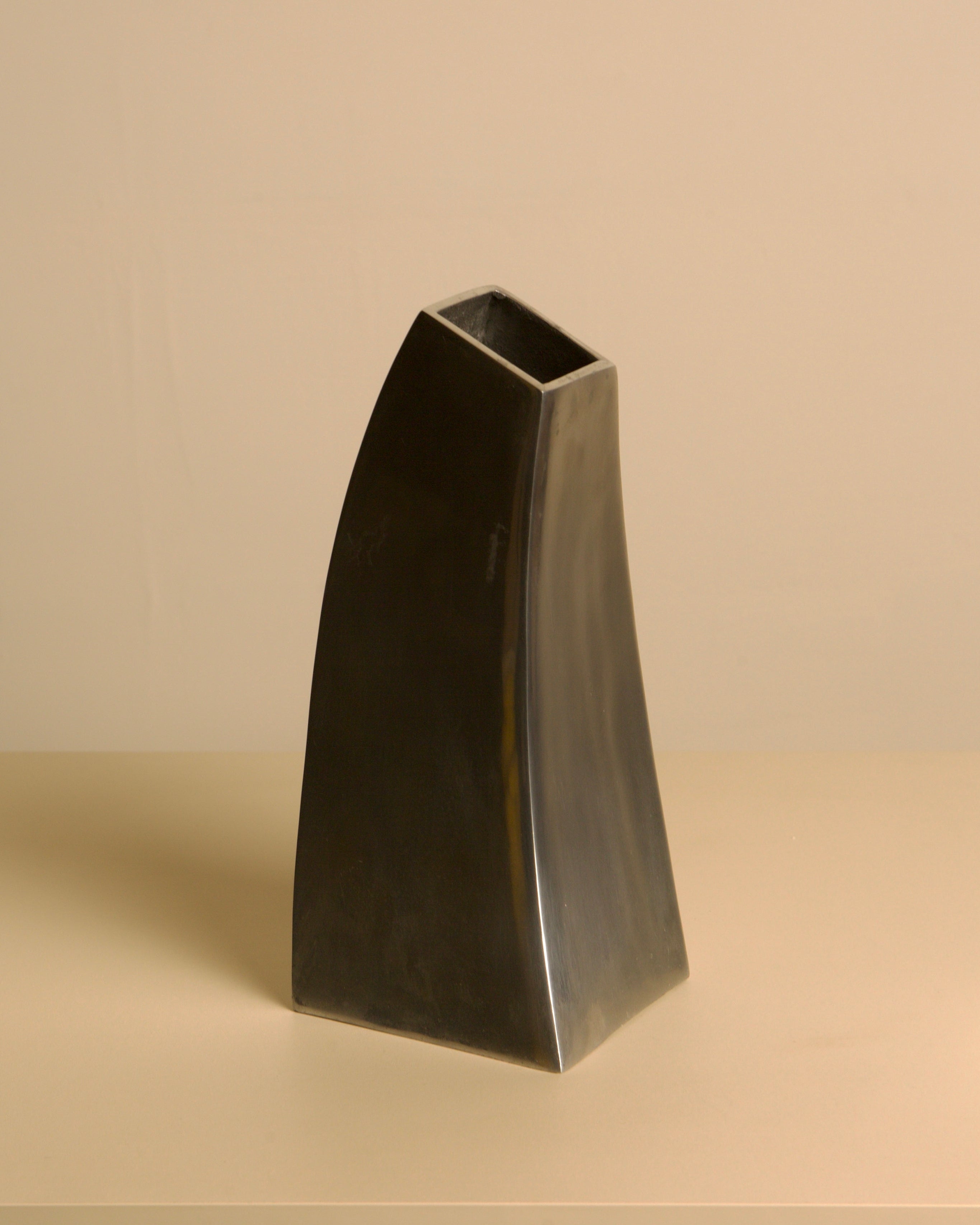 Corne vase in cast aluminum by Treaptyque | The Oblist — modern metallic finish