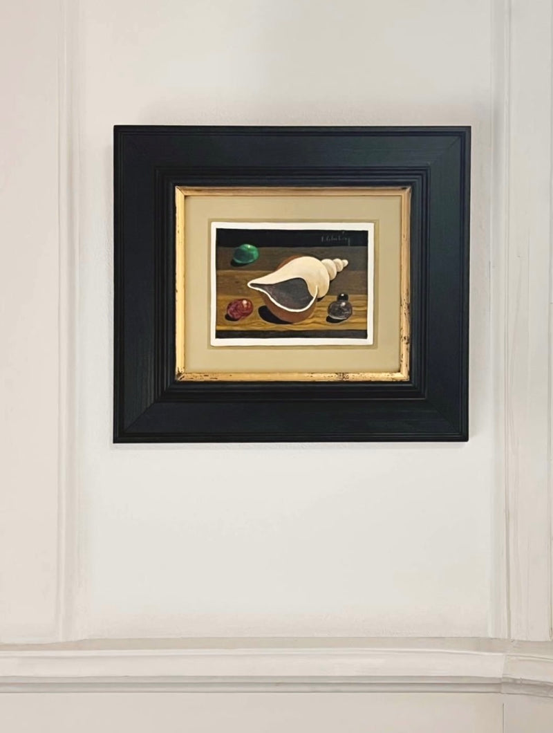 Still life painting with large shell, stones on wooden surface