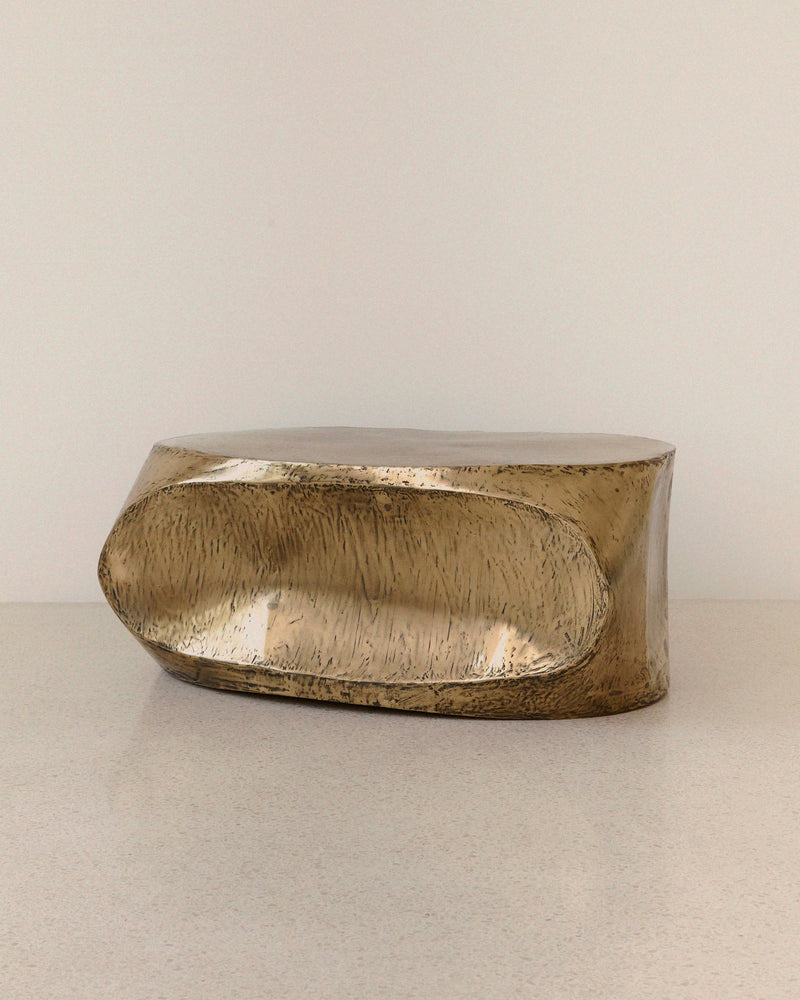 ROCHER brass resin coffee table side profile view by Atelier Ellery