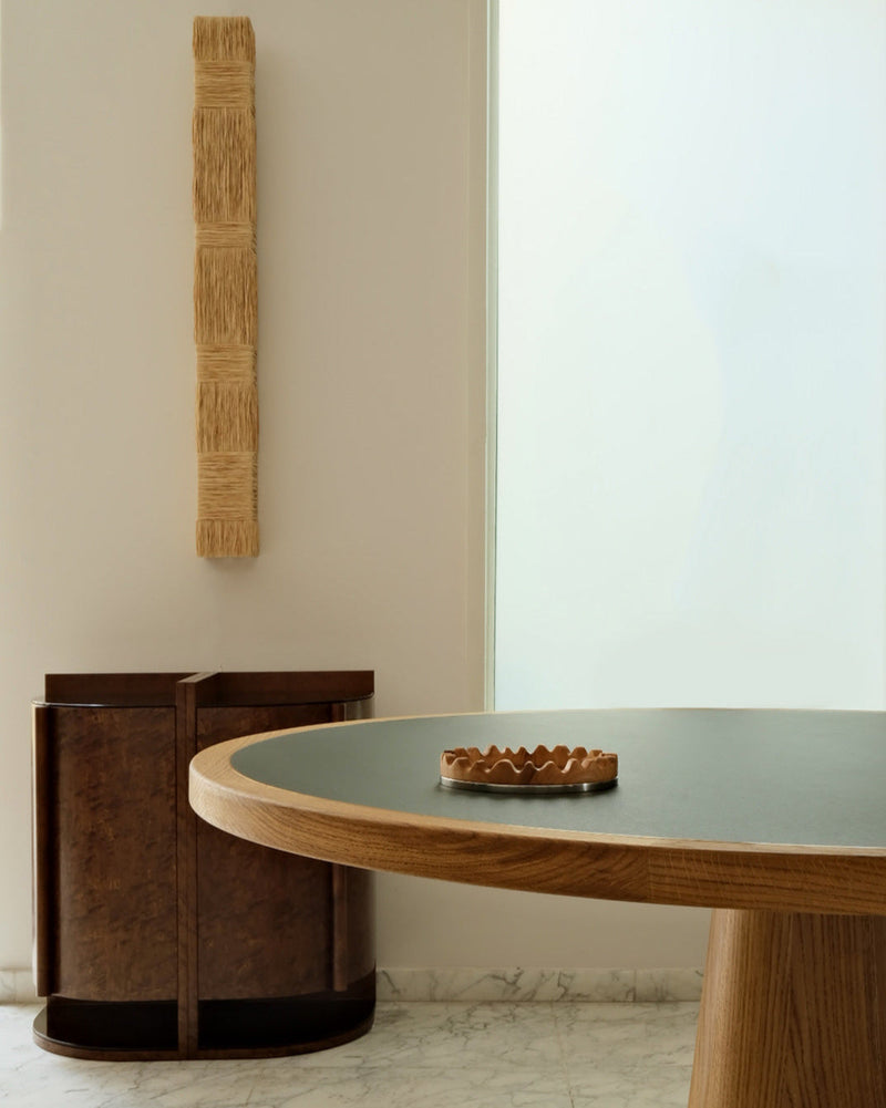 Yves Side Table / Cabinet (modular), in walnut — detail of cabinet against light wall