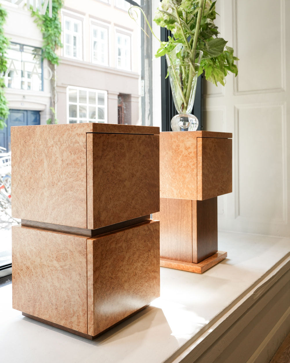 Bohult Due' Bedside Table — top view of light wood finish in window setting