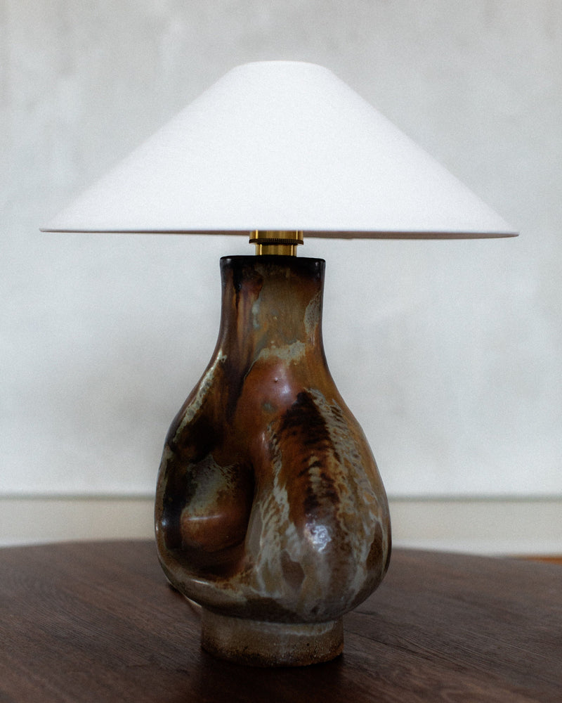 Ceramic table lamp with brown marbled glaze and white shade