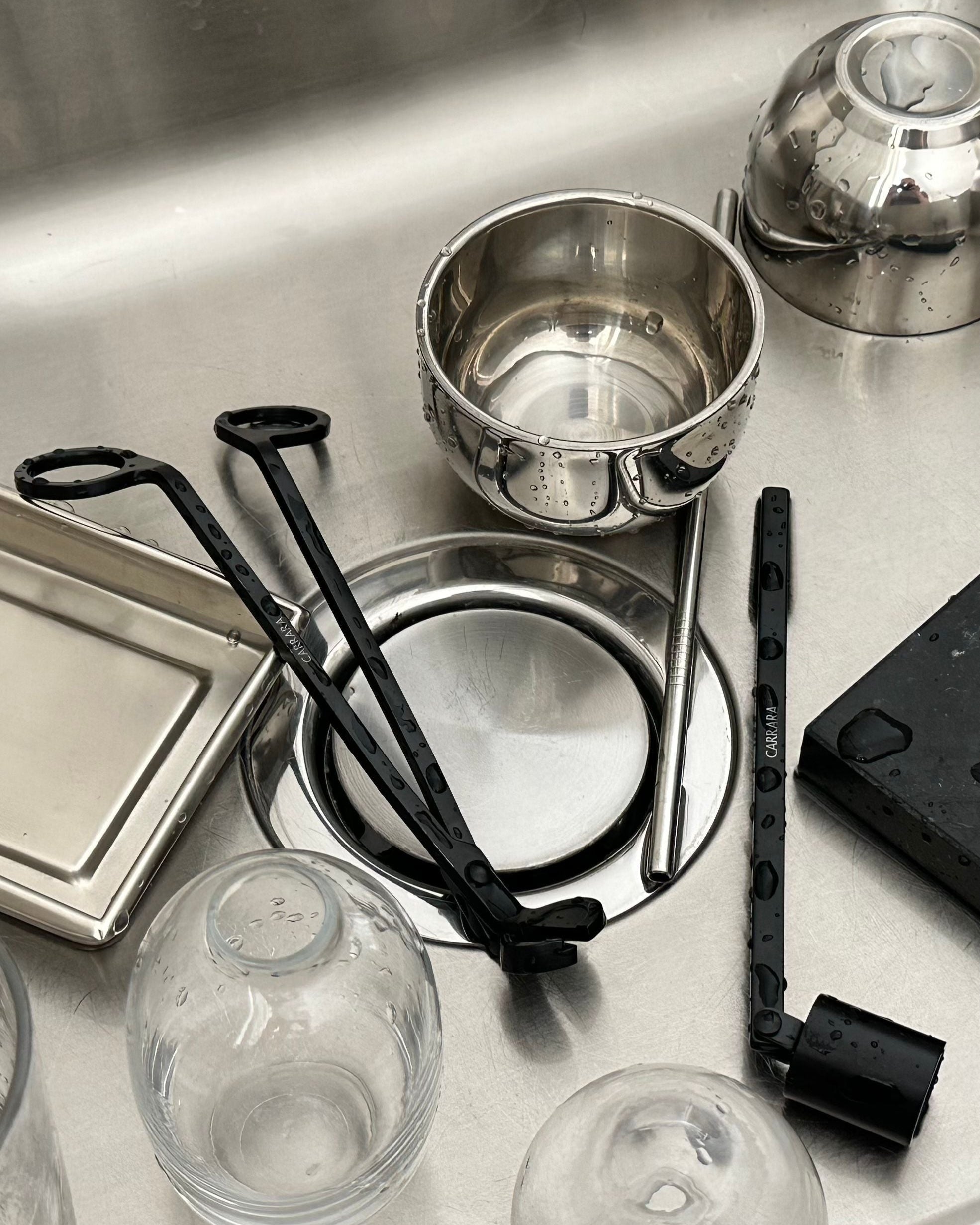 CARRARA' candle care set — side view with black tools on stainless steel