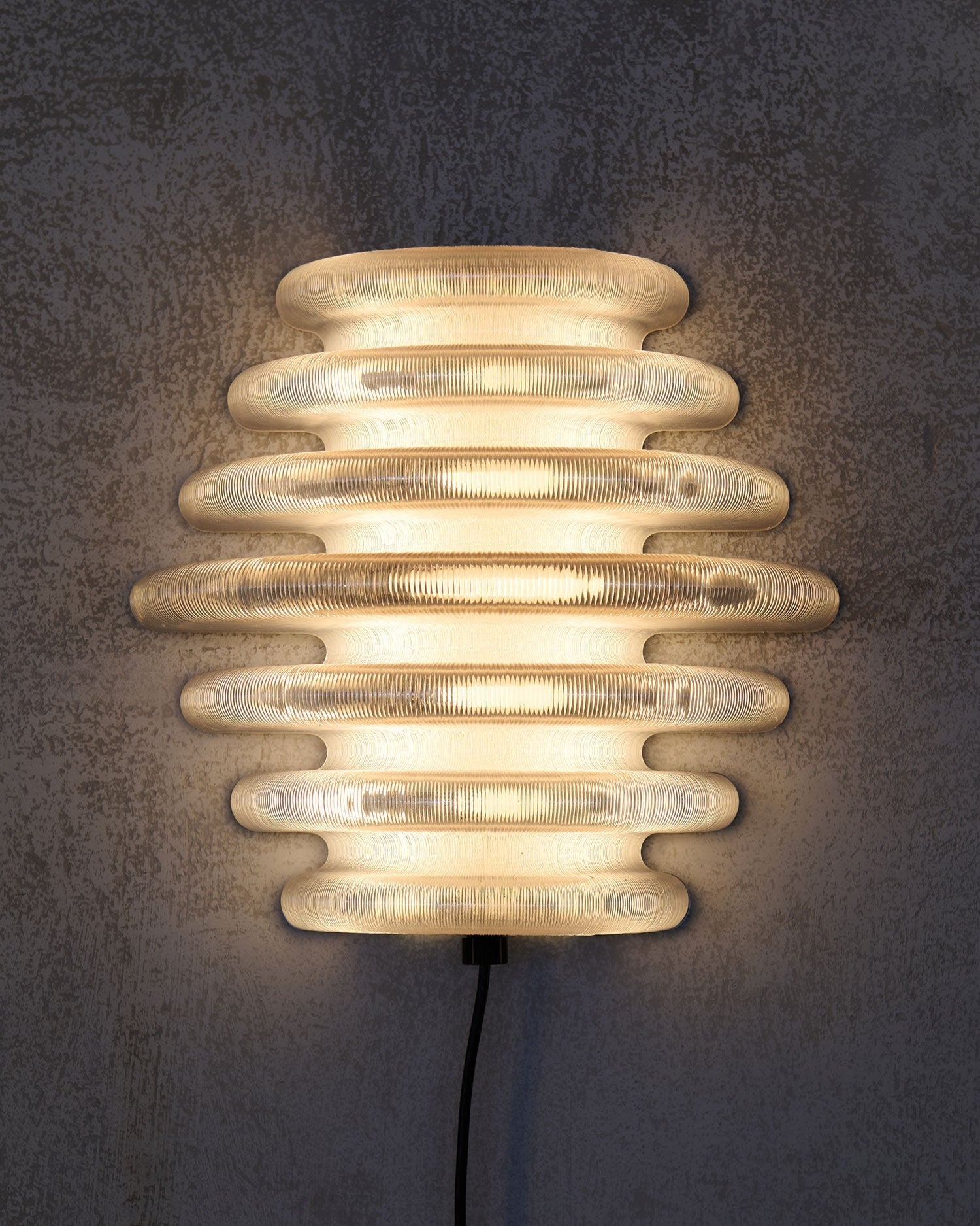 HIVE sculptural wall light with layered wooden ribbed design by Stijn van Aardenne