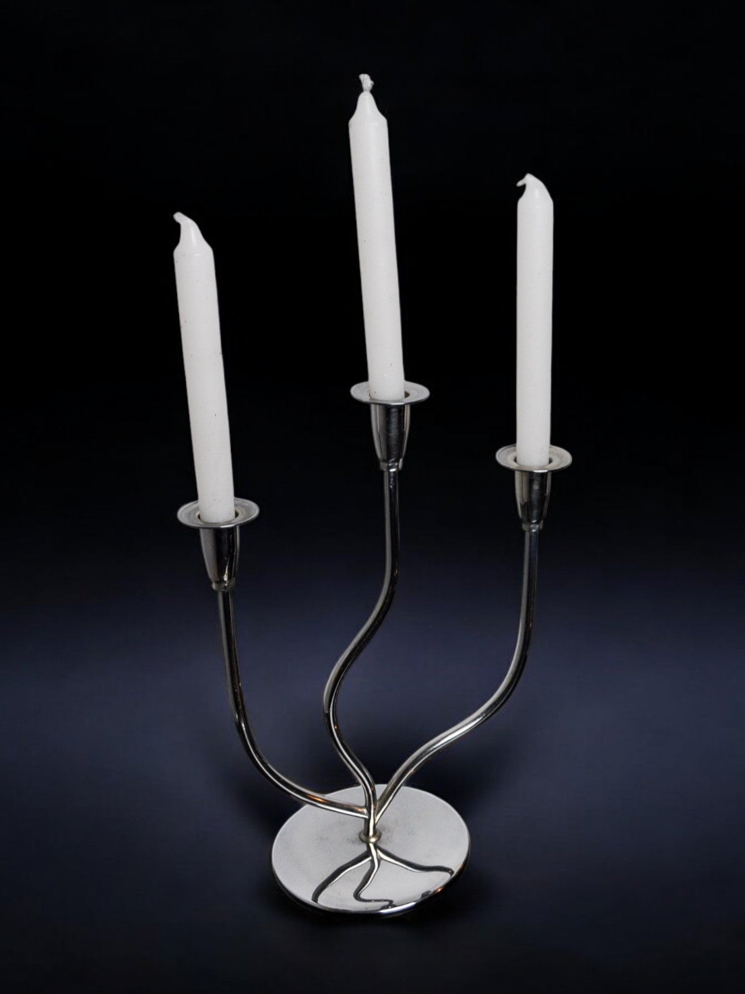 Art deco candlestick in stainless steel 3 flames, Spain, 1970 — lifestyle setting