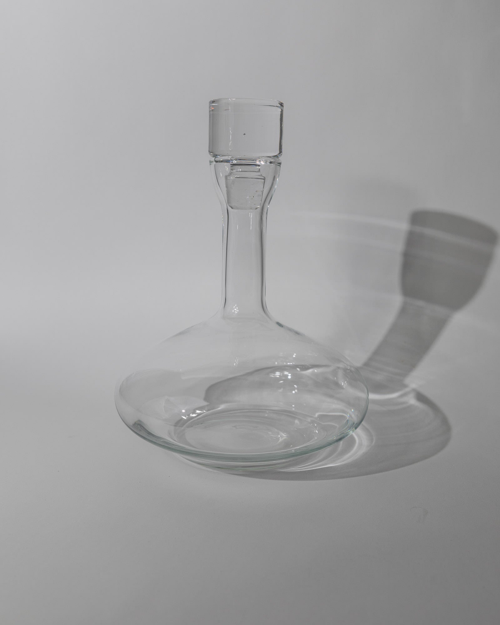 Vintage 1980s Glass Decanter, Italian Glass Ware with Glass Stopper — close-up of clear glass surface