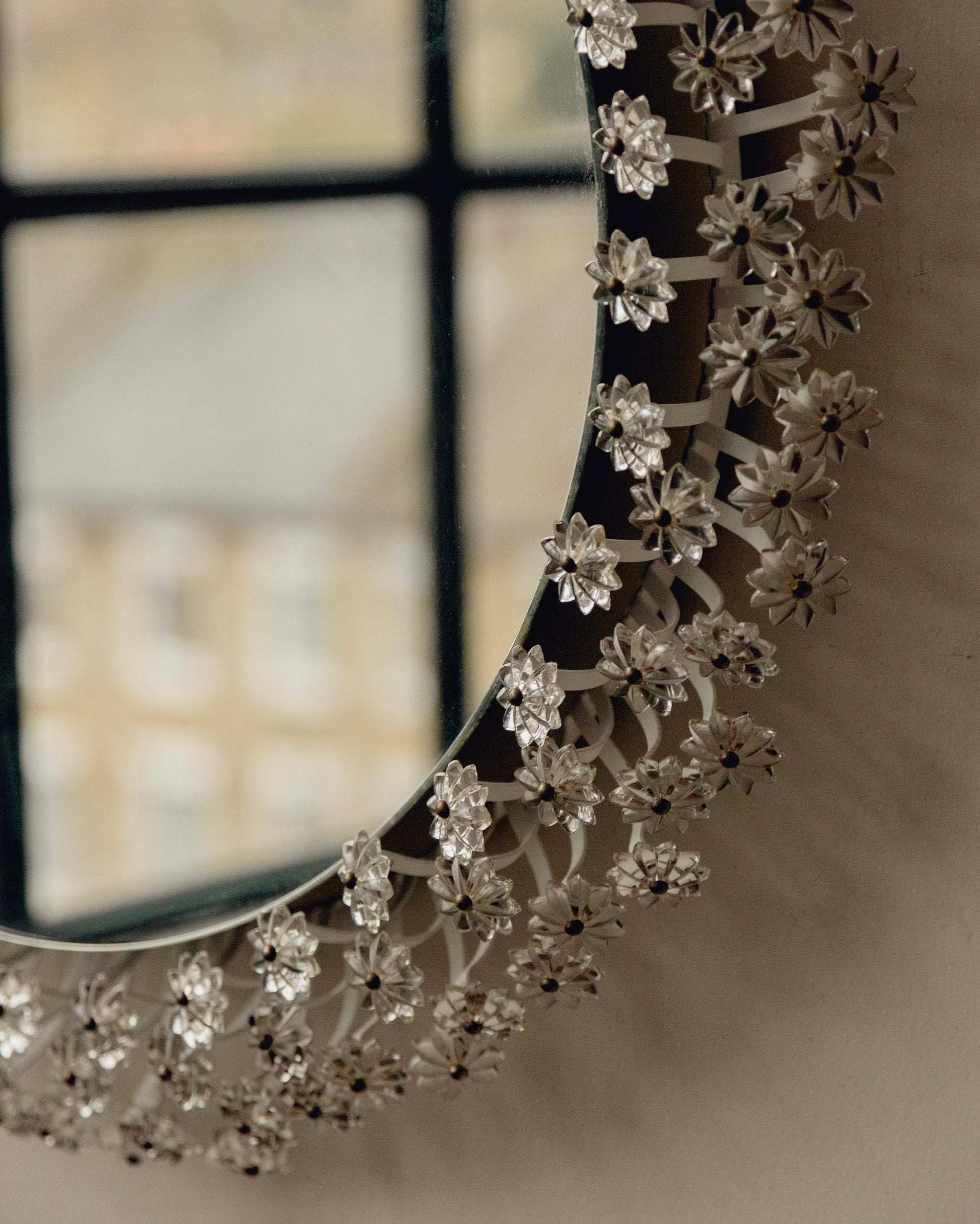 Mid Century Backlit Mirror by Emil Stejner — side angle showing floral metal frame