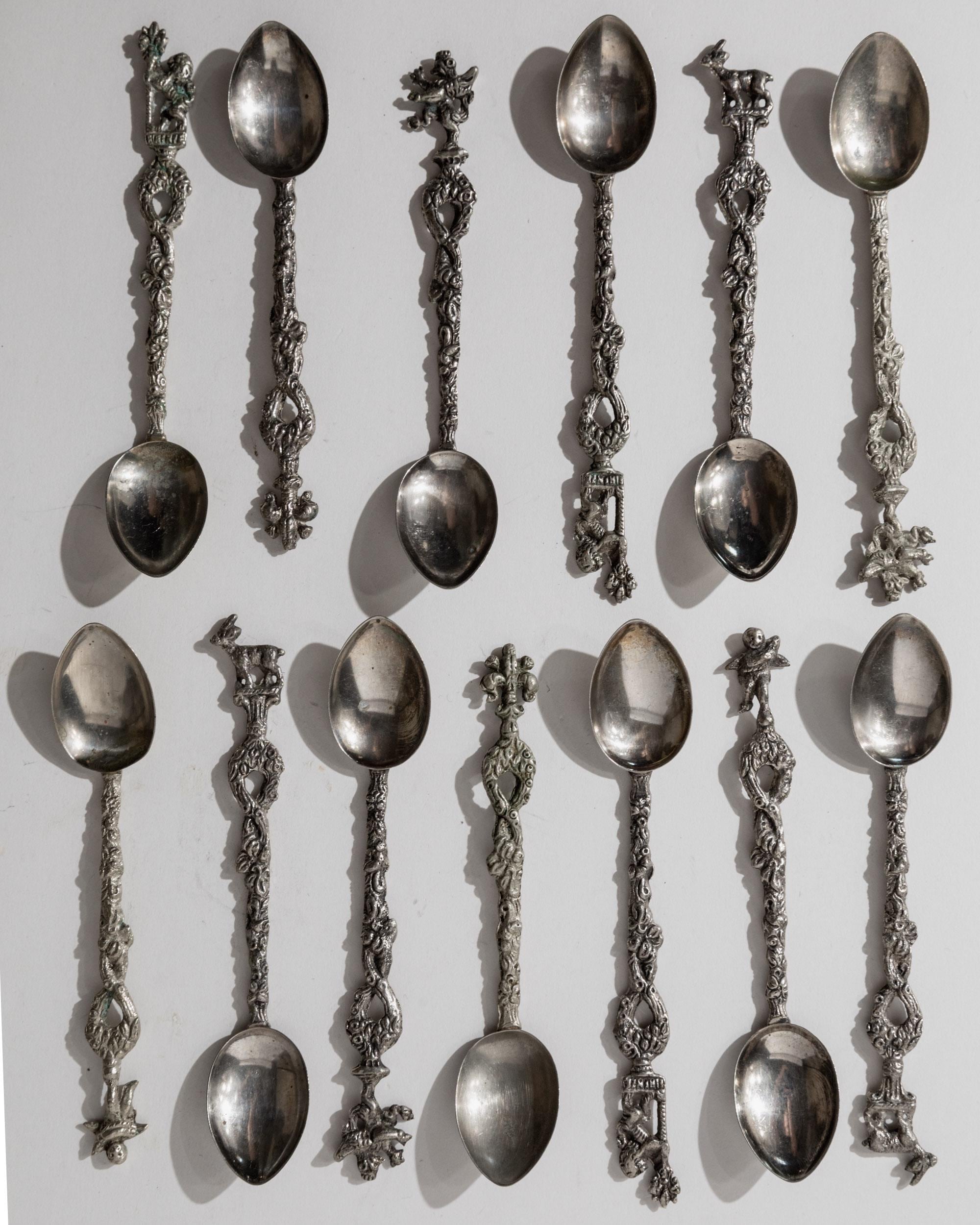 Vintage 1930s Silver Plated Tea and Cake Serving Set, 13 Ornate Spoons with Heraldic Figures and 1 Cake Server, Italian Tableware, Gift Idea — detail view