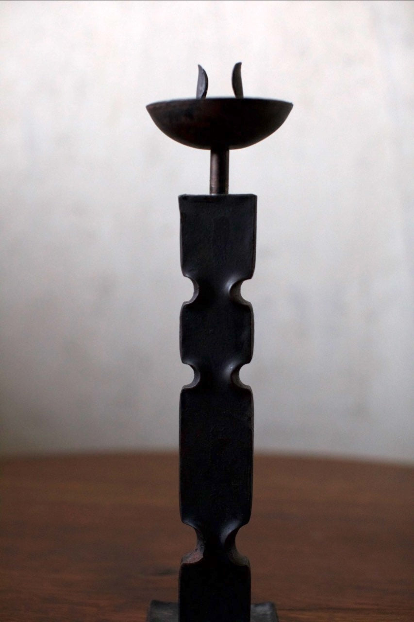 Brutalist Candleholder — front view highlighting dark metal design