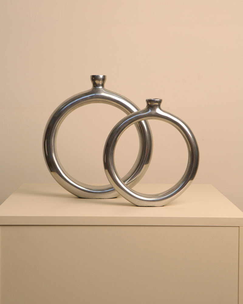 Pair of Italian aluminum circle vases from the 1980s