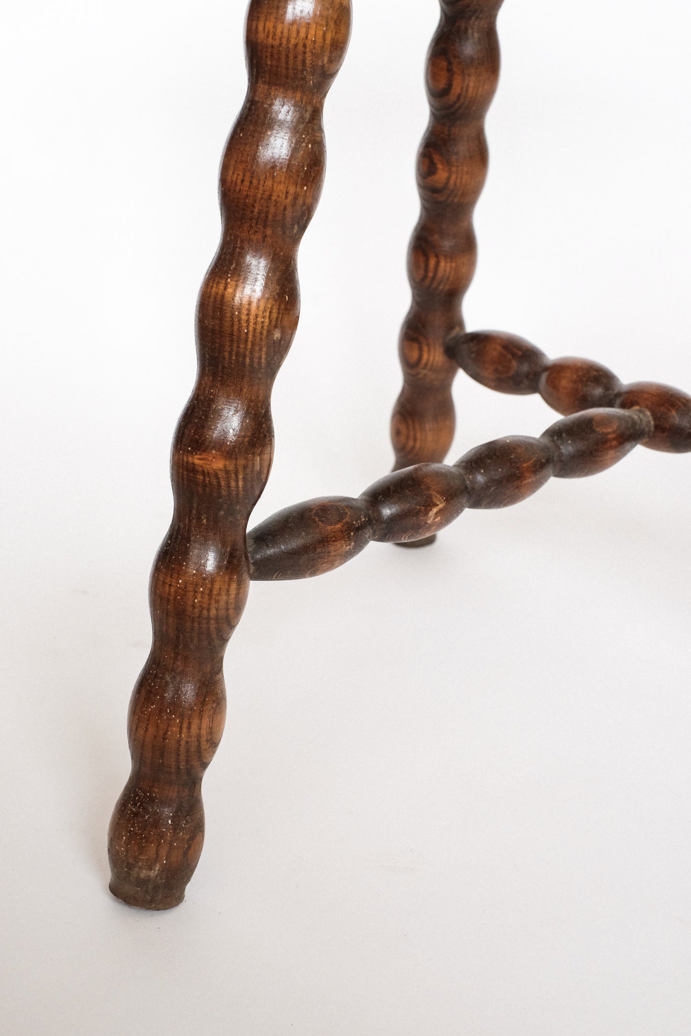 Charming Vintage French Bobbin Leg Wooden Stool — close-up
