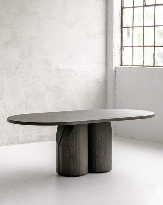 Barrow Dining Table in Solid Wood — angled view of oval tabletop and base