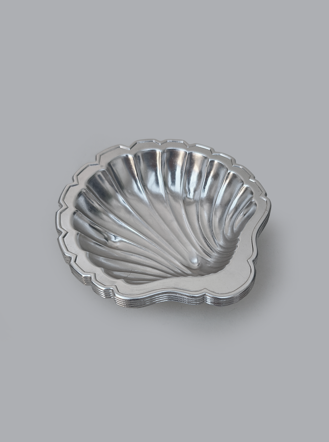 Set of 4 Shell Cups — close-up of shiny metallic surface