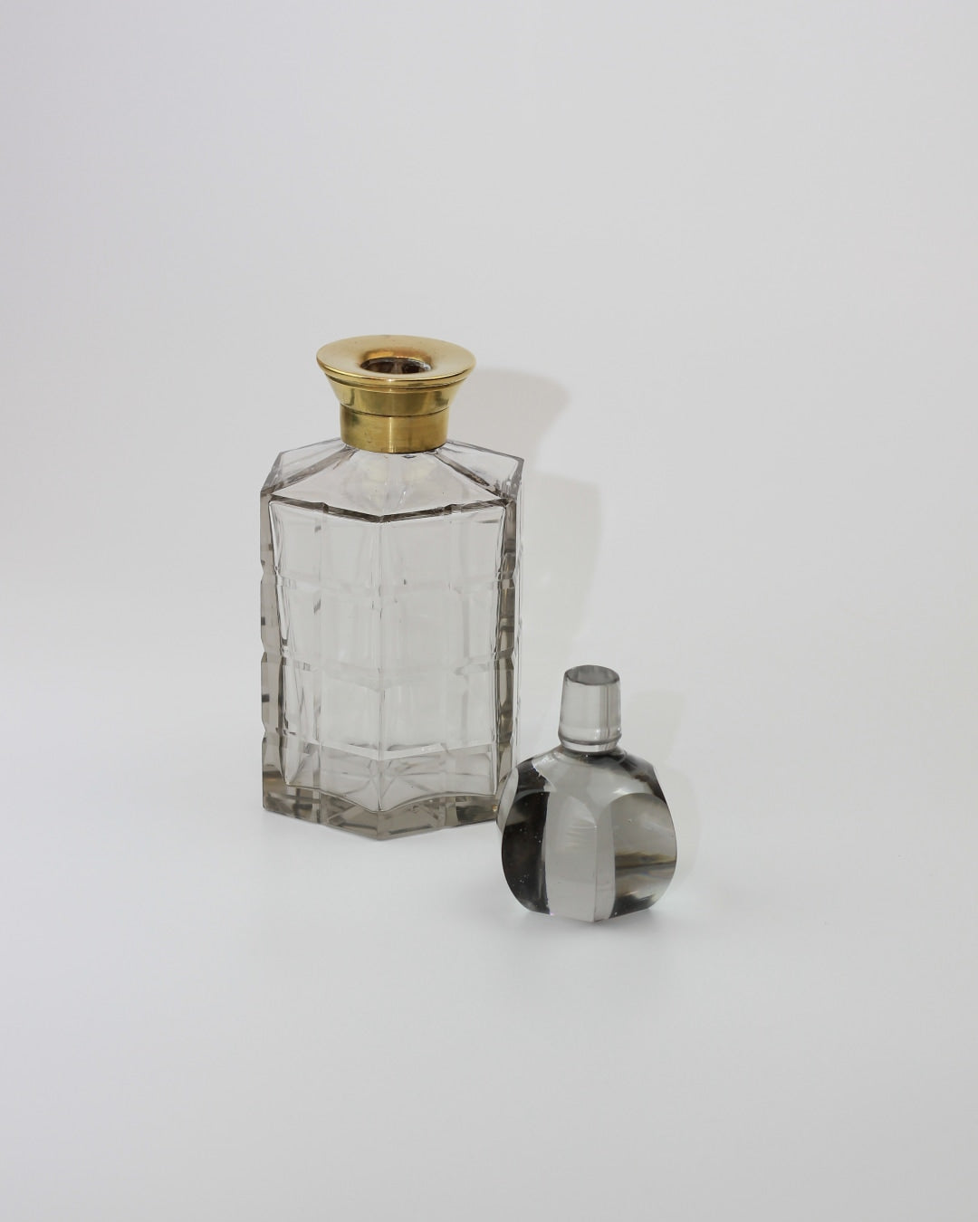 Crystal Decanter — side angle showing clear glass and brass top