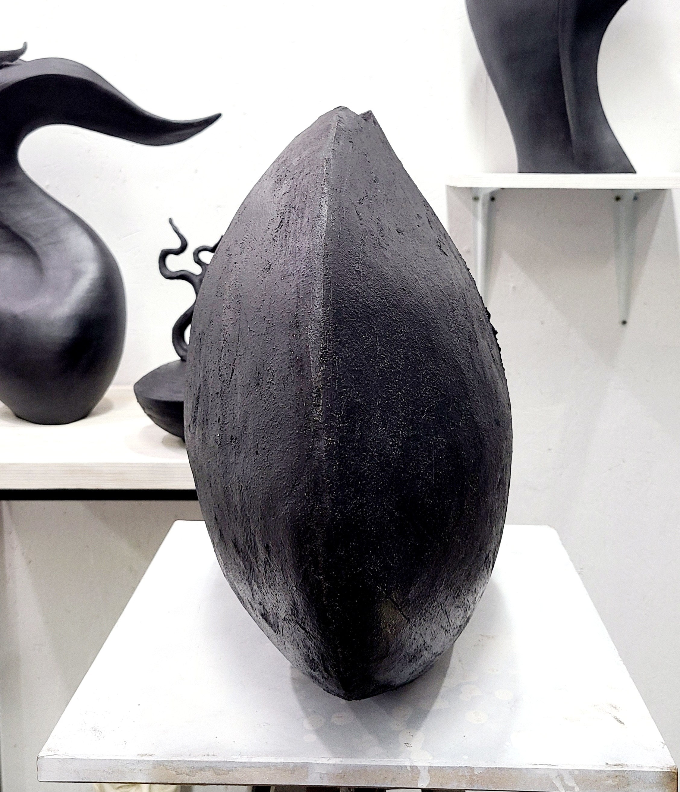Organic Modernism Vessel in Black Clay - "Belly" — side view highlighting textured surface