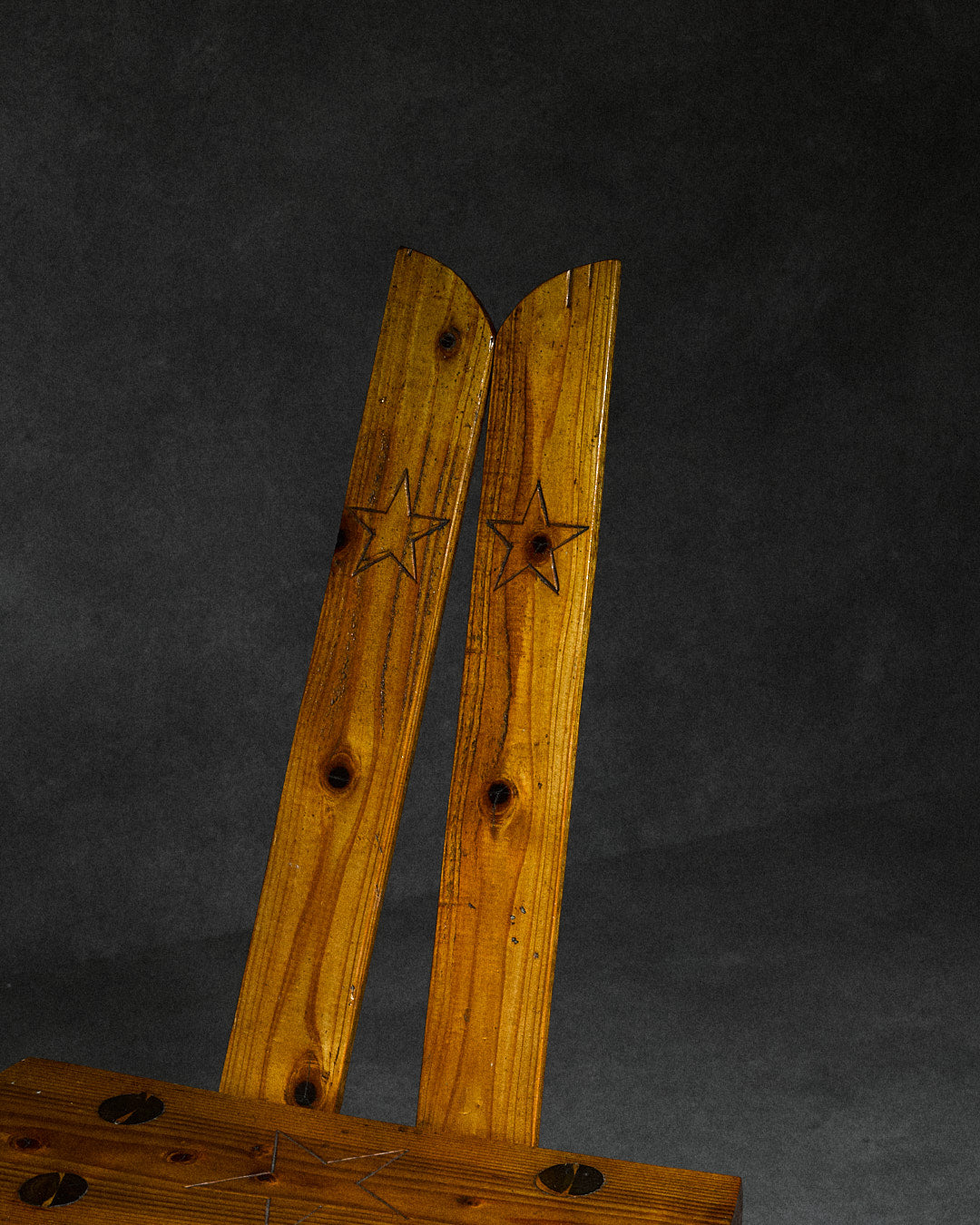 Set of 4 Folk-art Pine Chairs from the Italian Alps — top view of carved wooden backrest