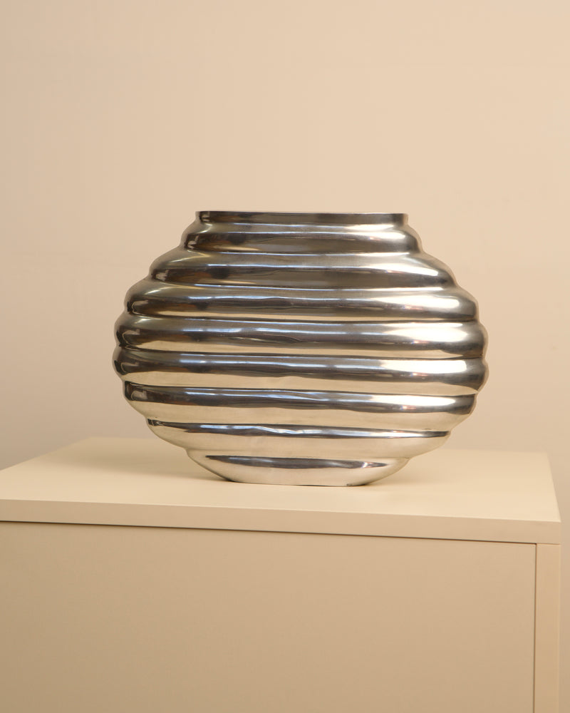 Ribbed cast aluminum vase with spherical form from the 1980s