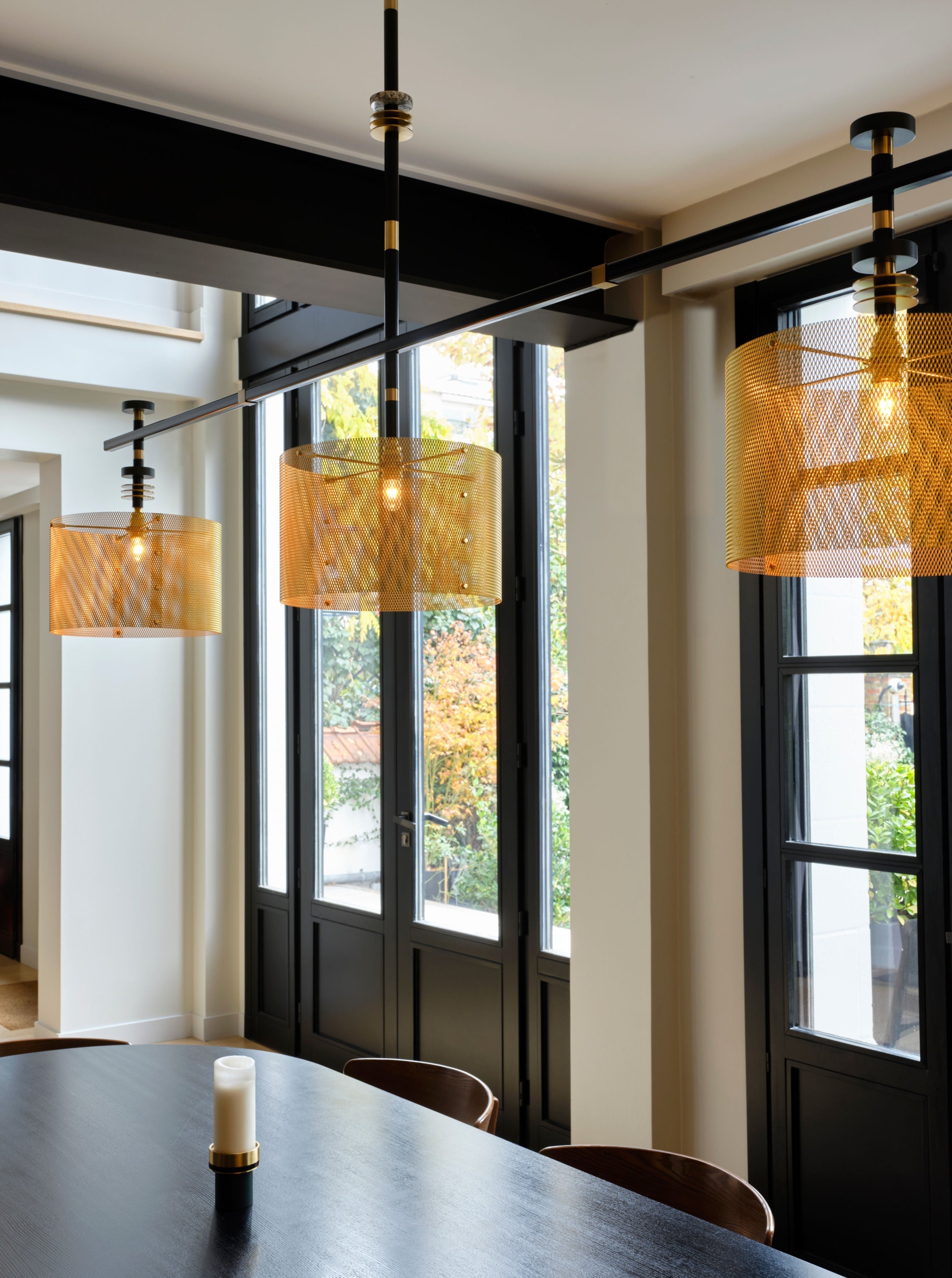 Juliette Ceiling Light — hanging above dining table in modern kitchen