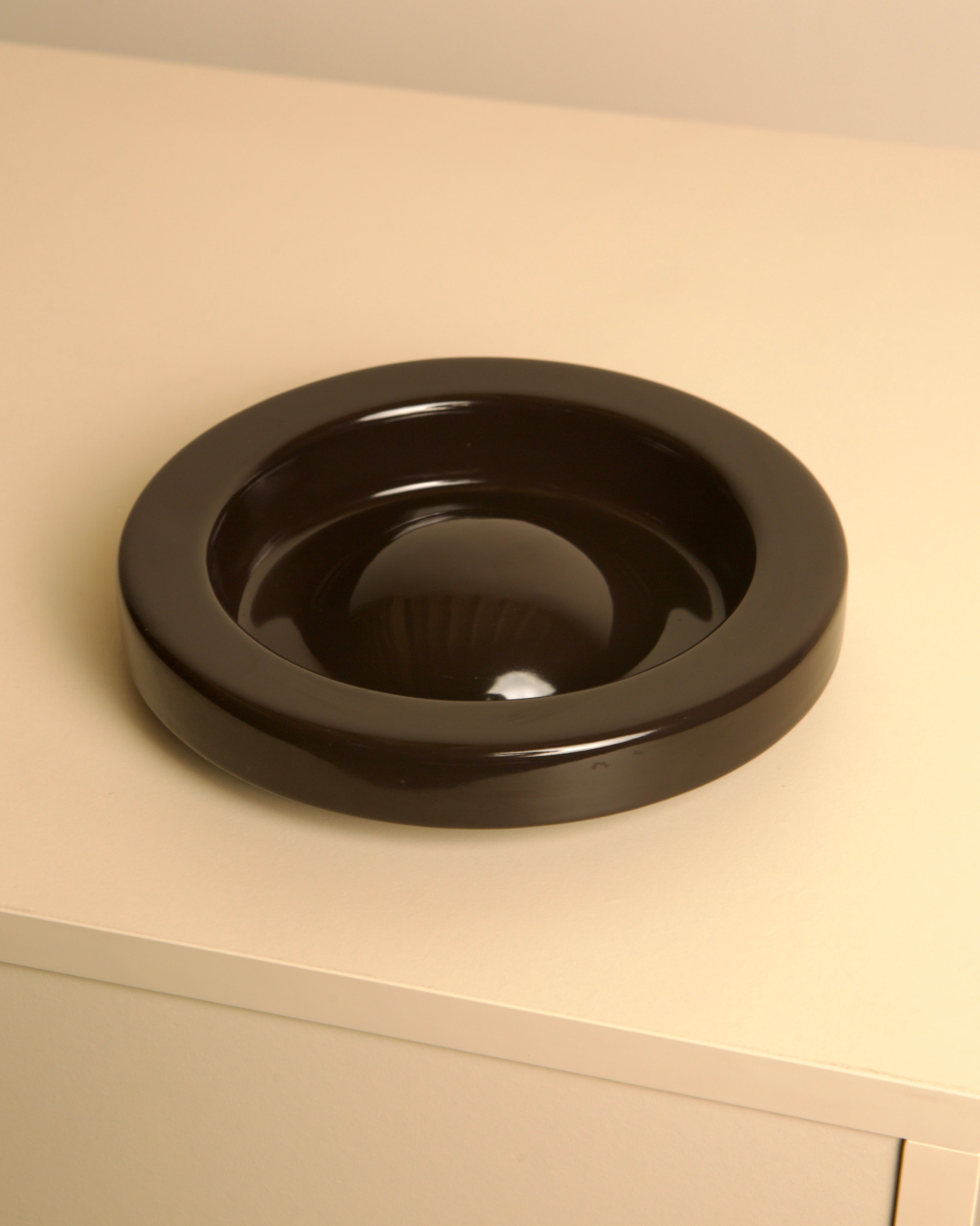 Black ceramic round ashtray with deep bowl, vintage 1980s design