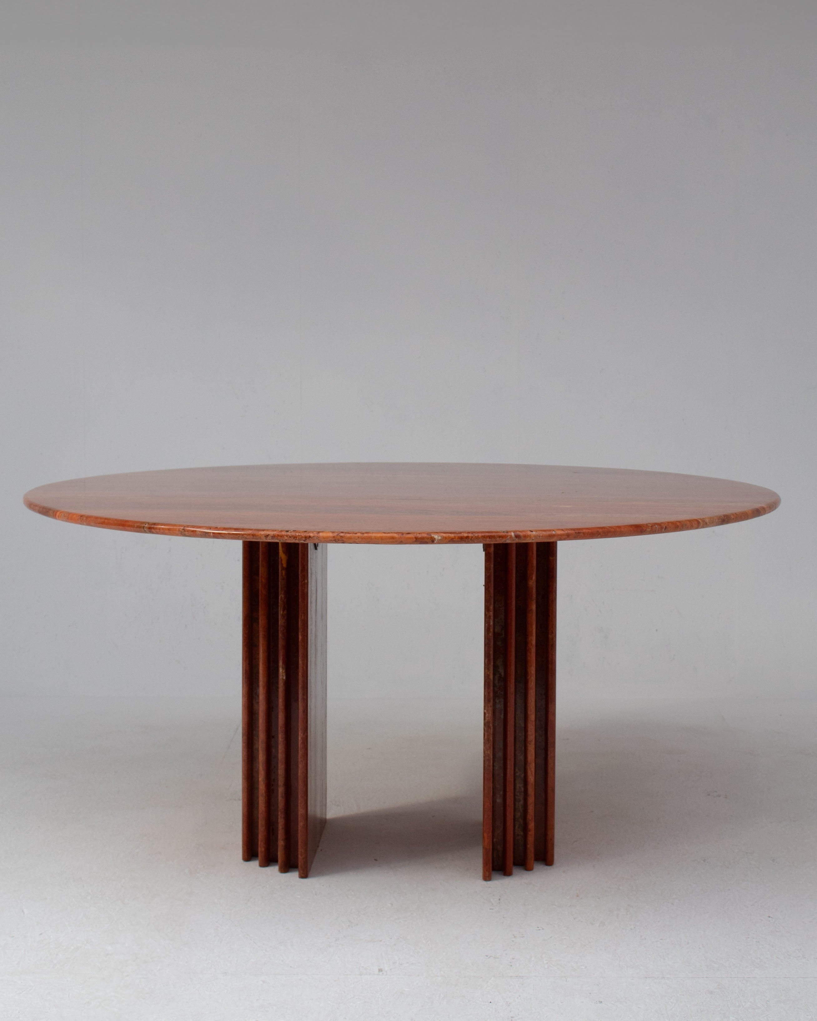 Round Dining Table in Rosso Travertino
