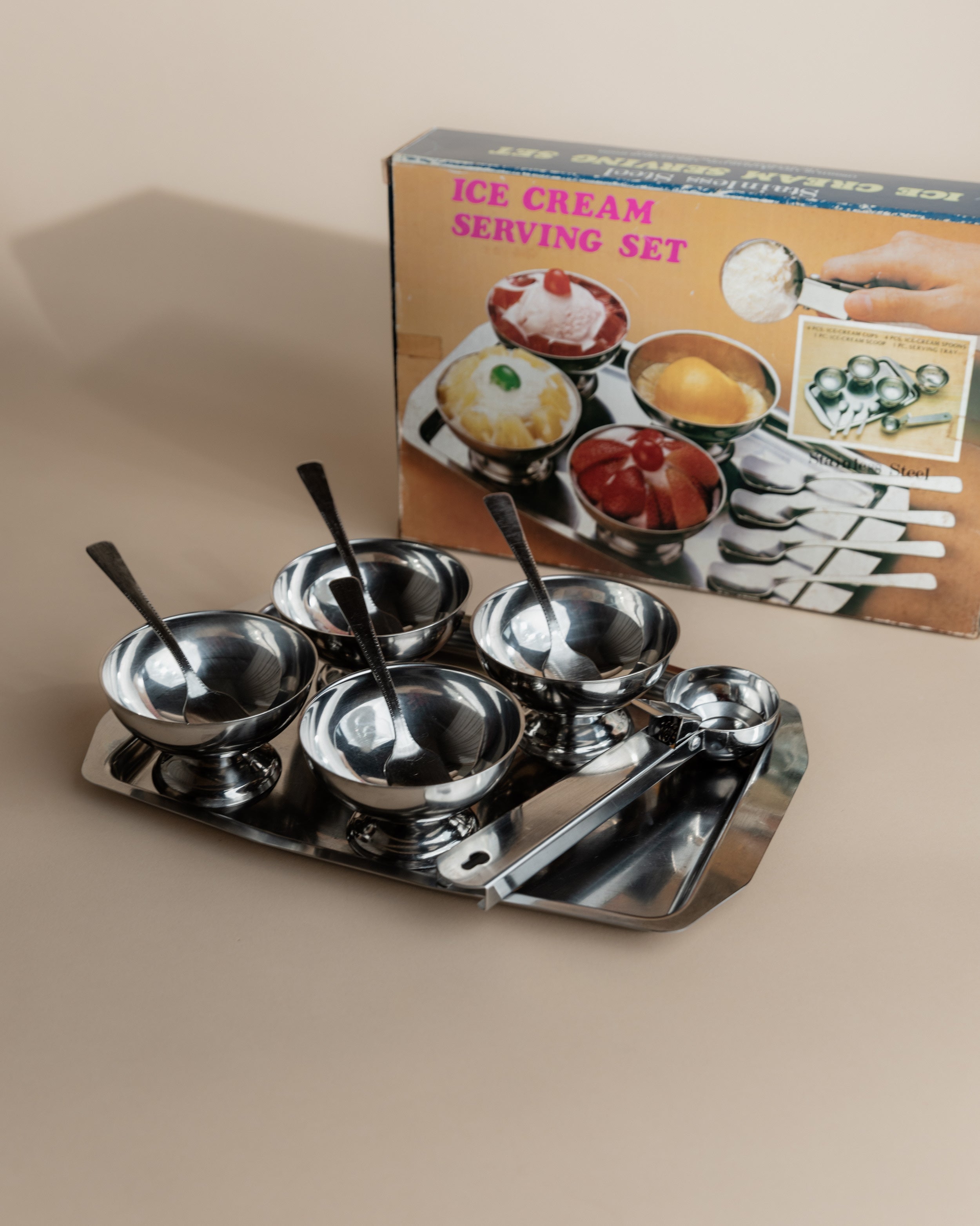 Vintage 1970s Ice Cream Serving Set for 4, Stainless Steel Cups, Spoons, Tray, Scoop — side angle showing stainless steel cup