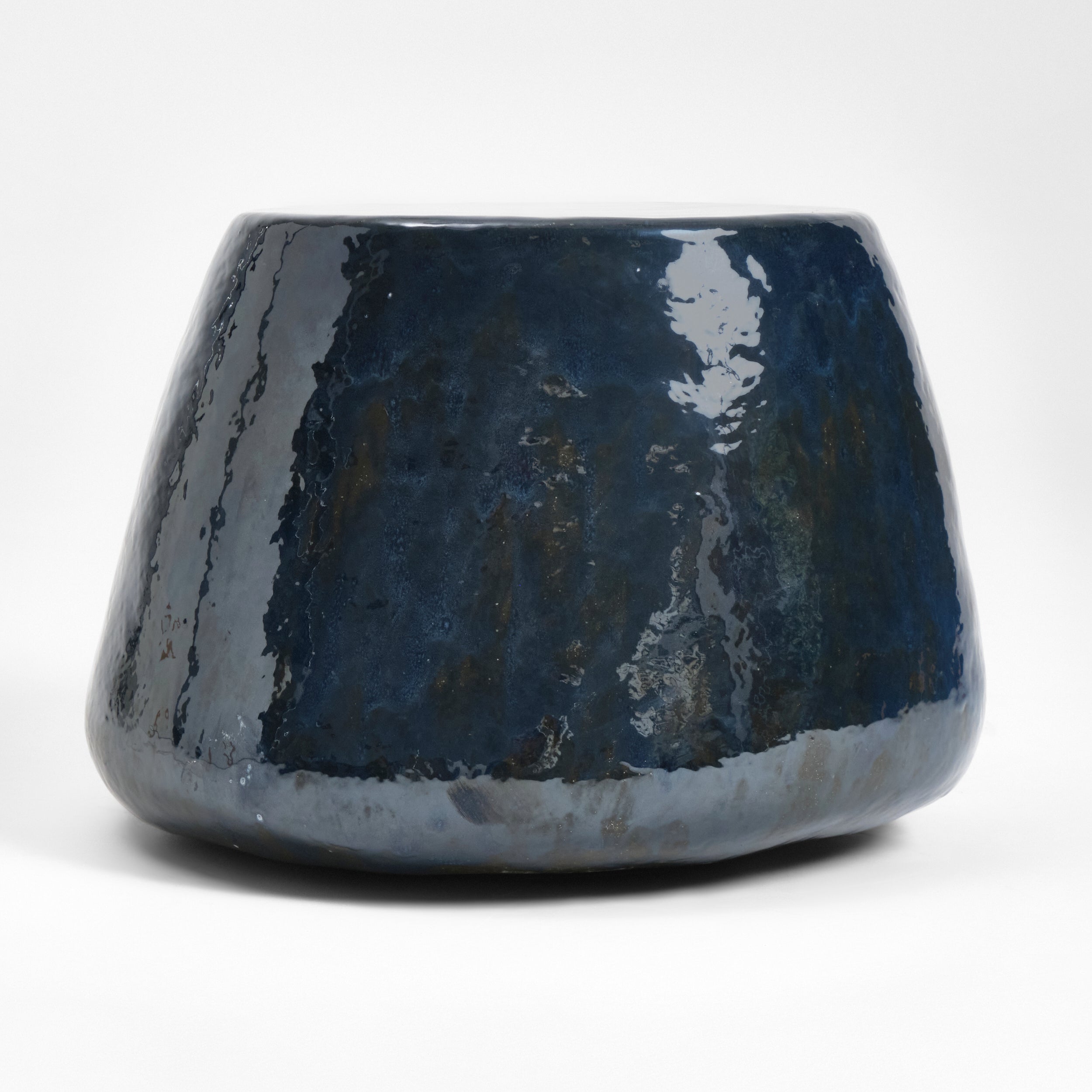 Medium Ceramic Side Table — side view of glossy navy surface