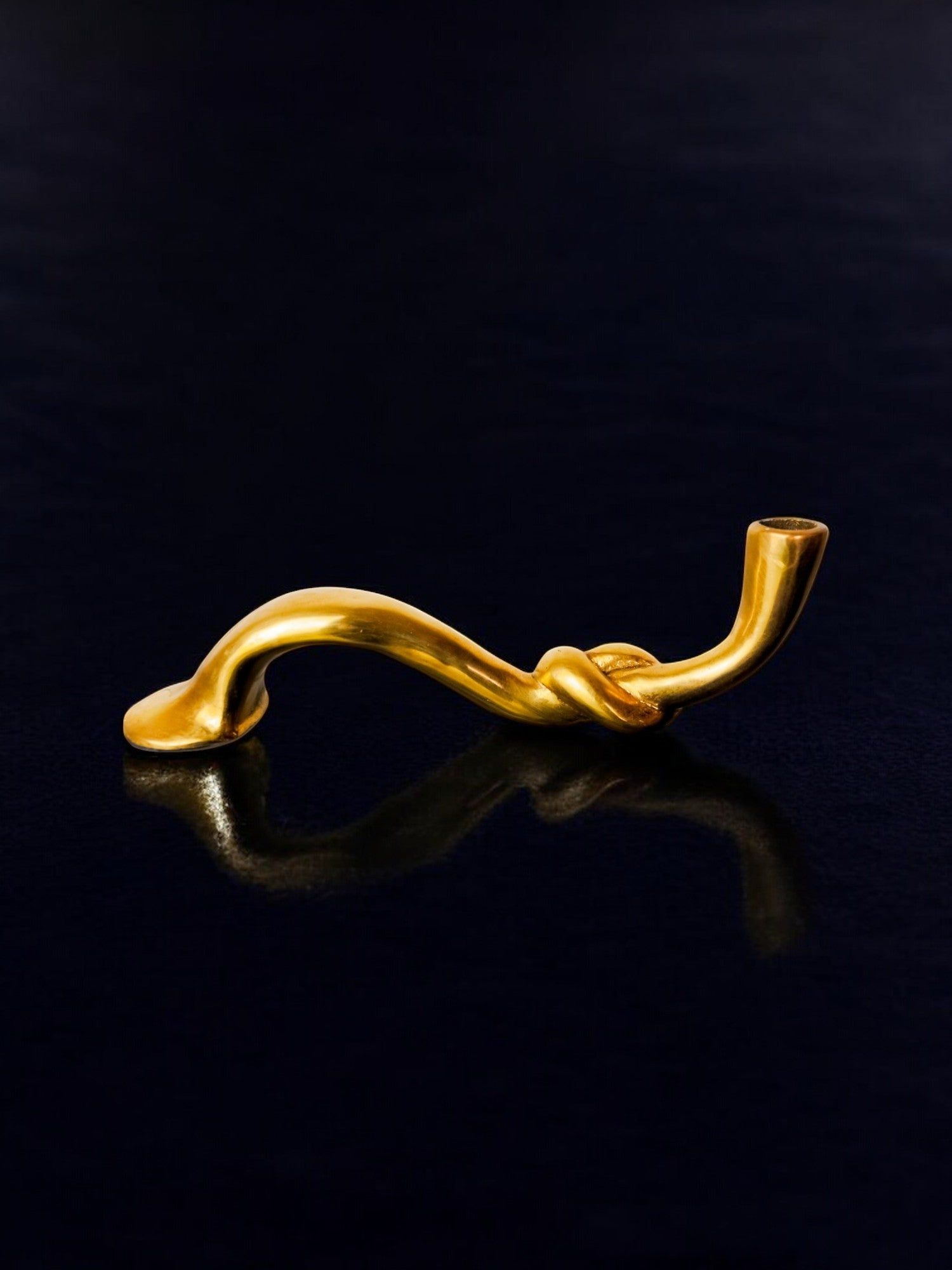 Knot Candleholder in Bronze, Italy, 1970s — side angle showing twisted design