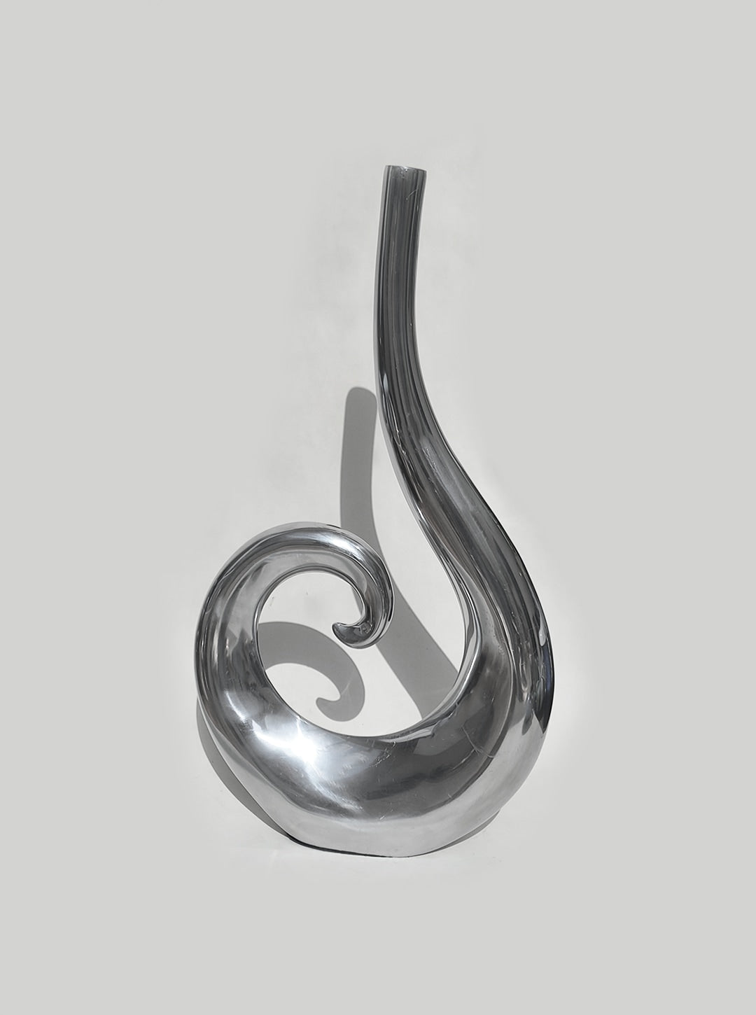 Large Spiral Vase — top view highlighting polished metal finish