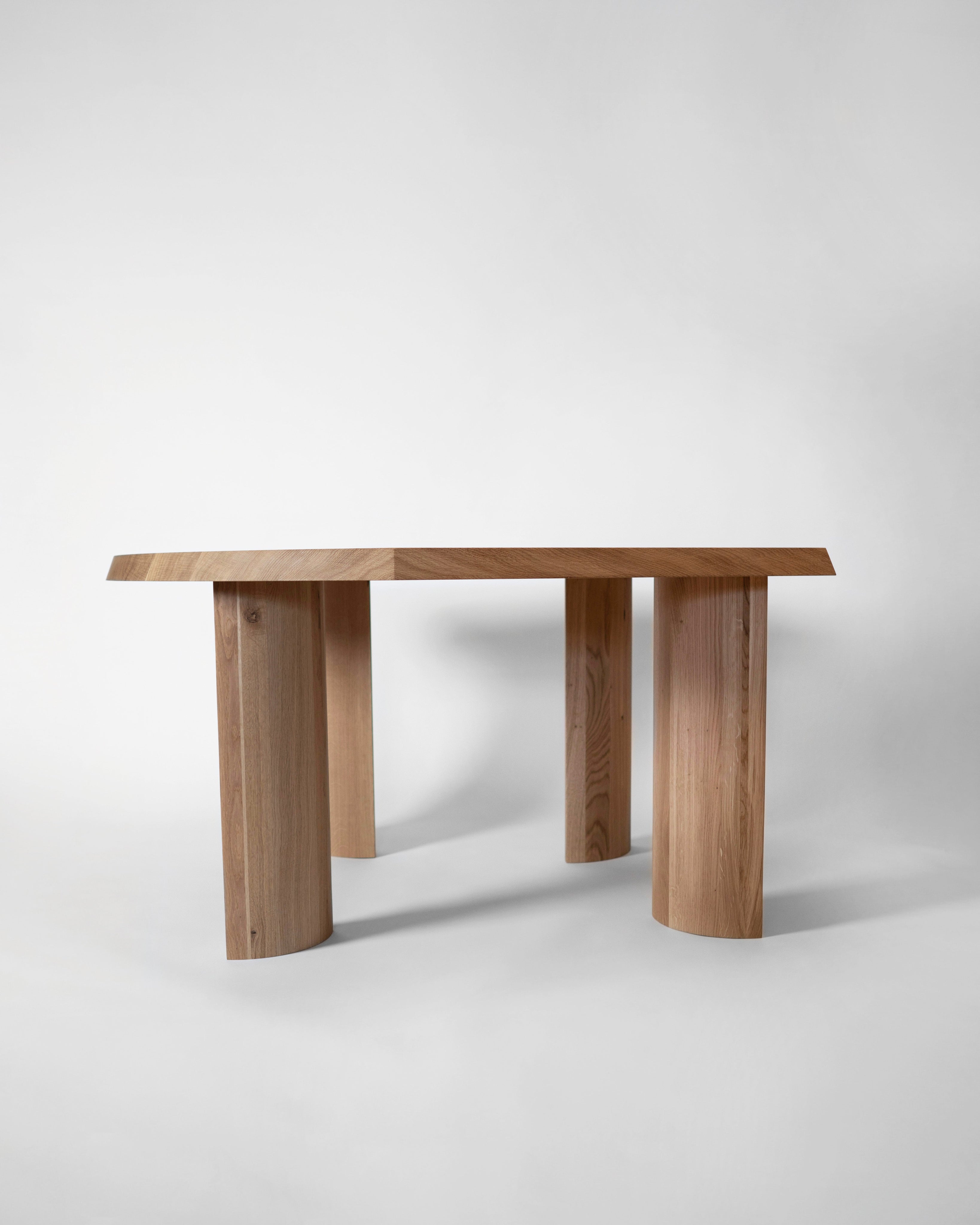 Gilbert Edge Dining Table - Oak — side angle showing solid oak legs
