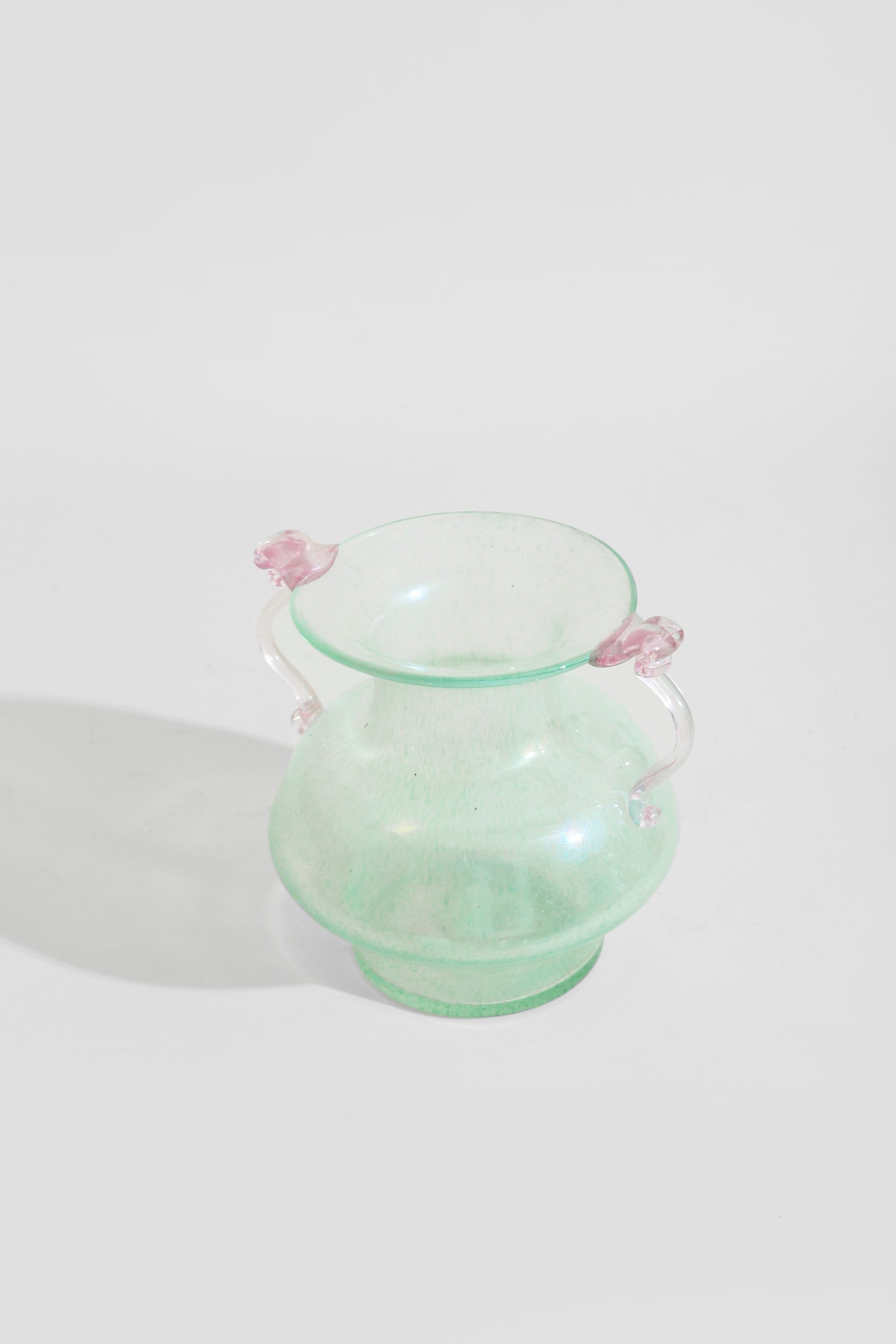Italian Murano Glass Amphora — side angle with mint green glass and pink handles