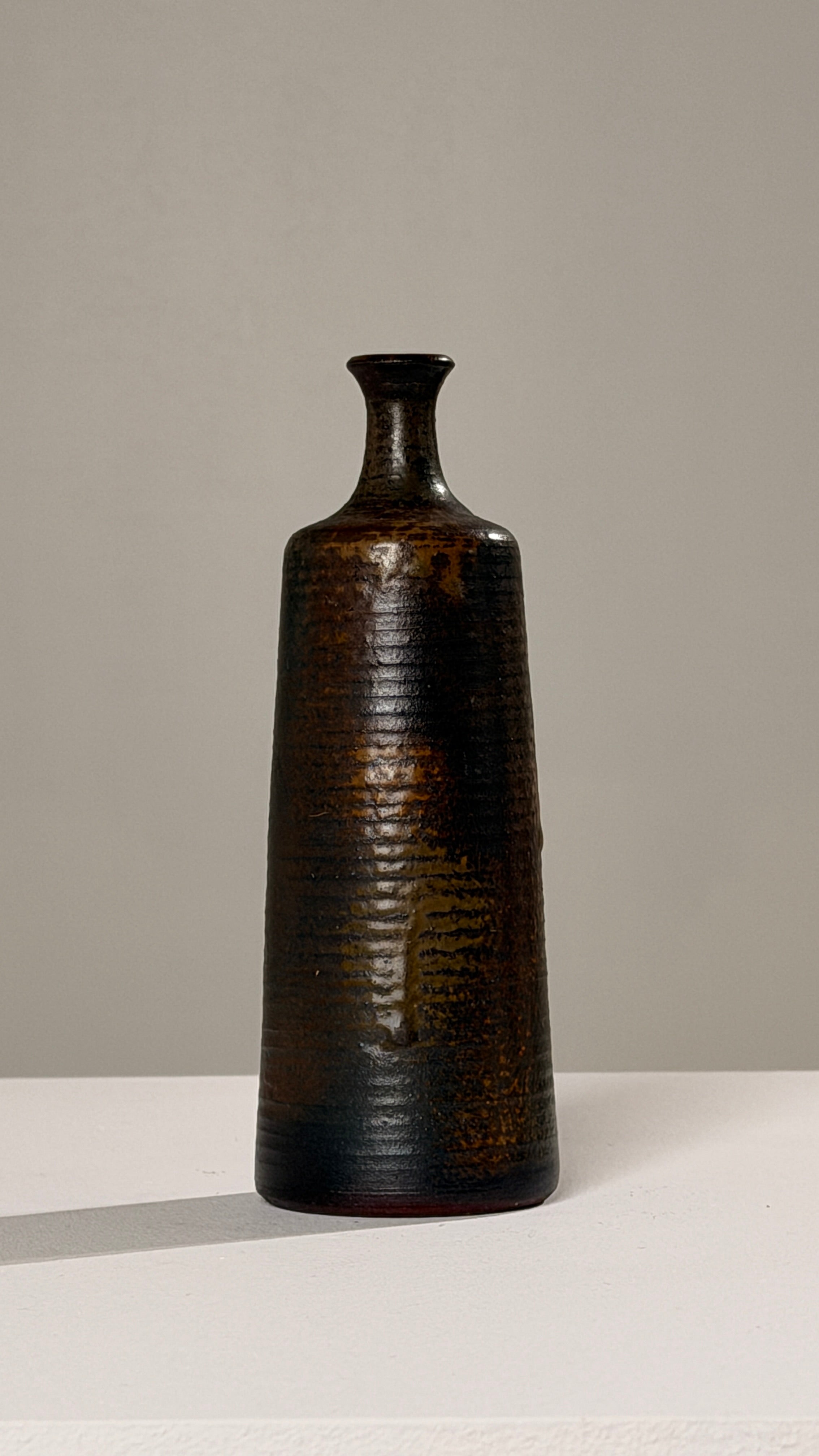 Elegant Stoneware Soliflore Vase, France, circa 1960 — close-up of textured dark surface