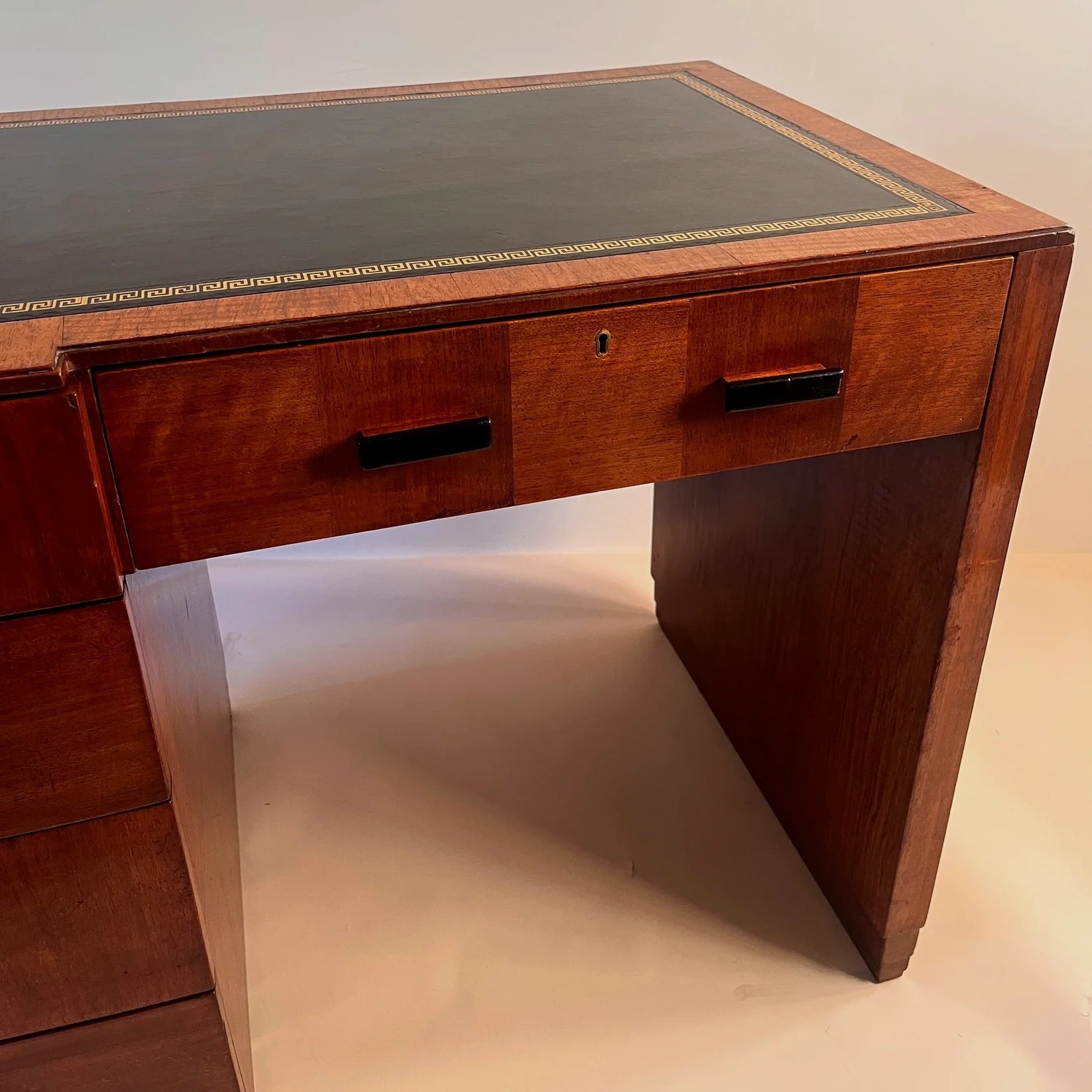 Vintage Desk in Leather - Art Deco Collection — close-up of wooden drawer with leather top