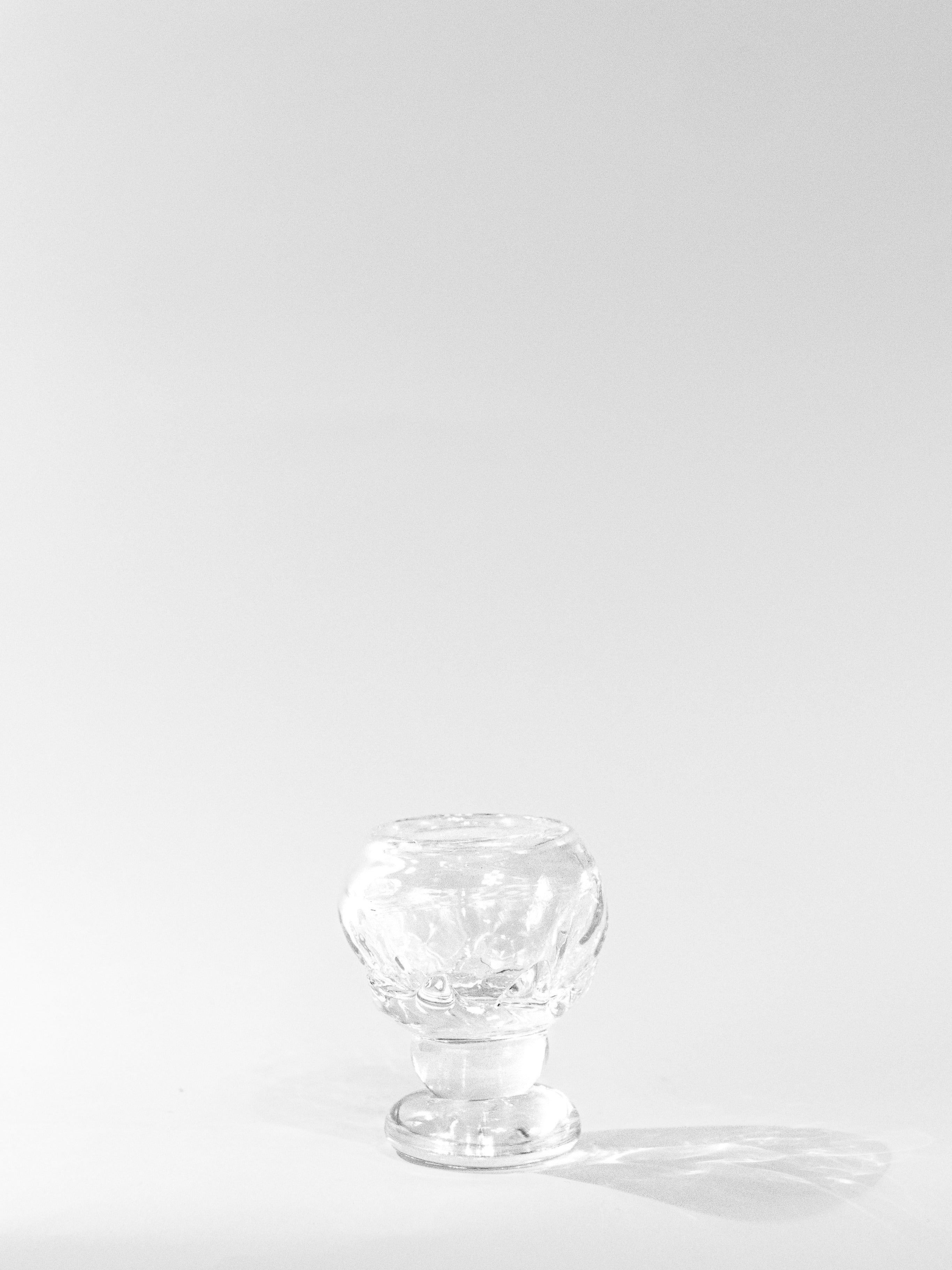 Organic Shaped Footed Table Glass — side angle on white background