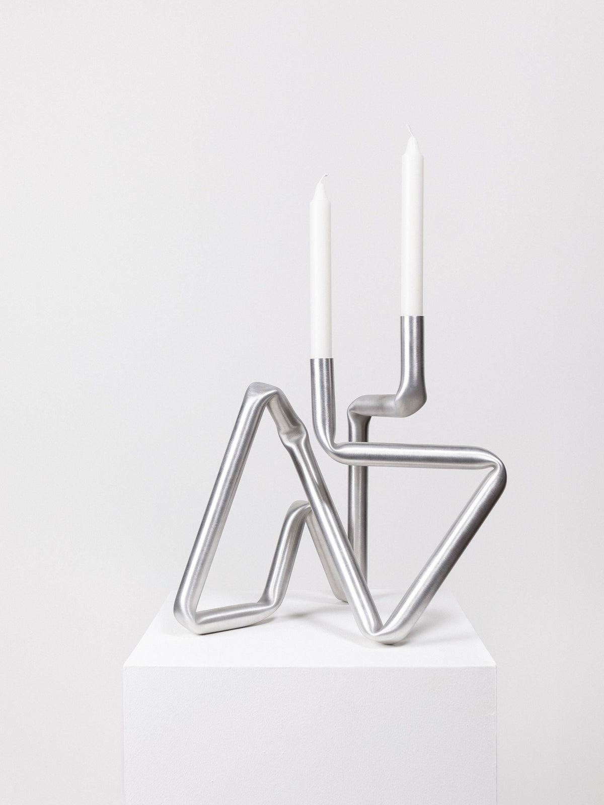 Bucati Candle Holder (brushed aluminium) — in context