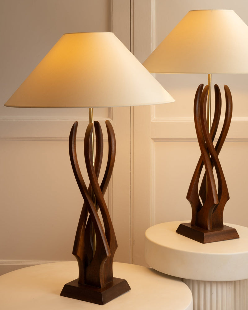 Pair of sculptural walnut table lamps with conical shades, 1960s