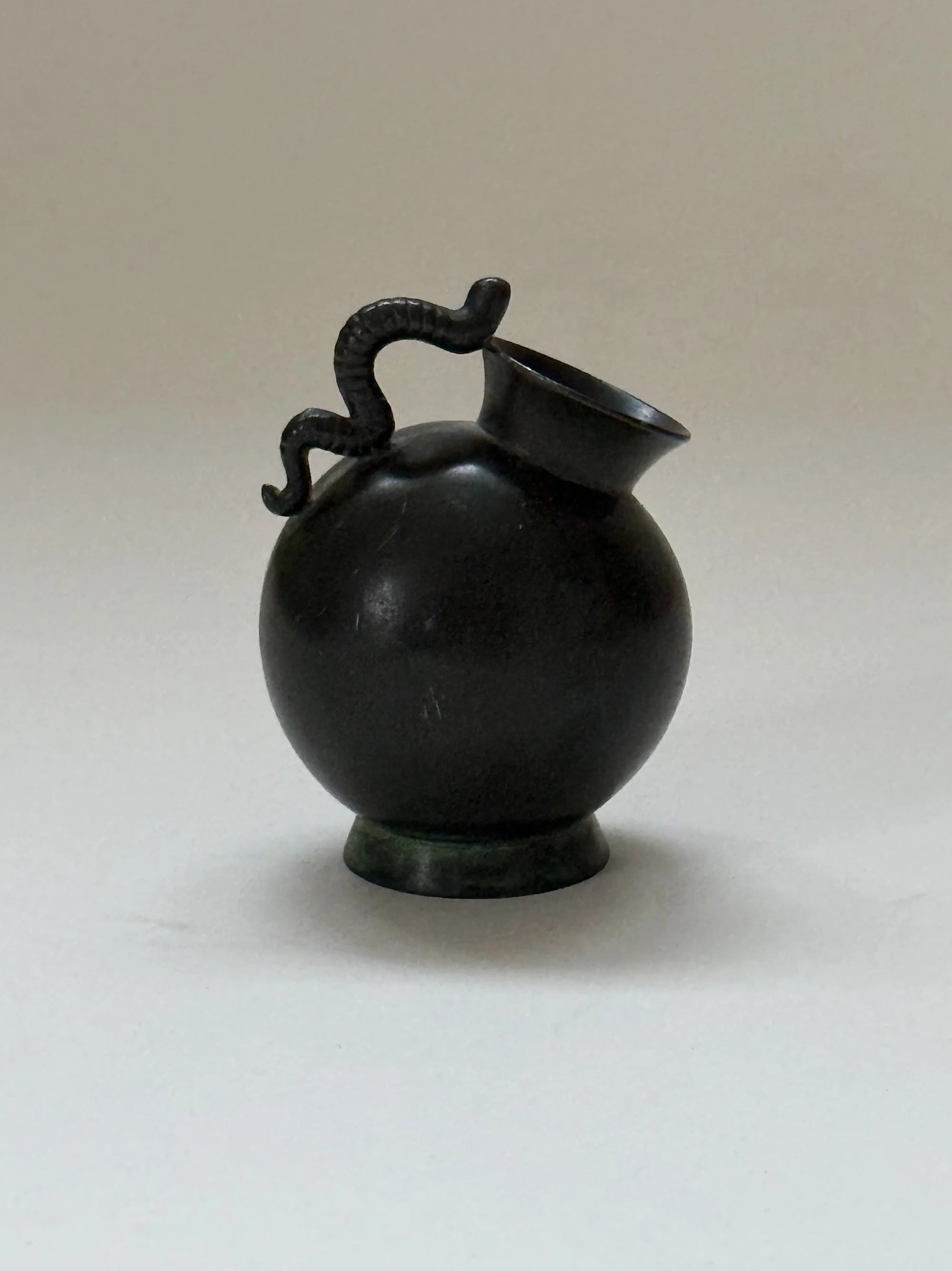 Small Just Andersen Vase in Disko Metal, Denmark, 1930s — side angle showing curved handle and rounded body