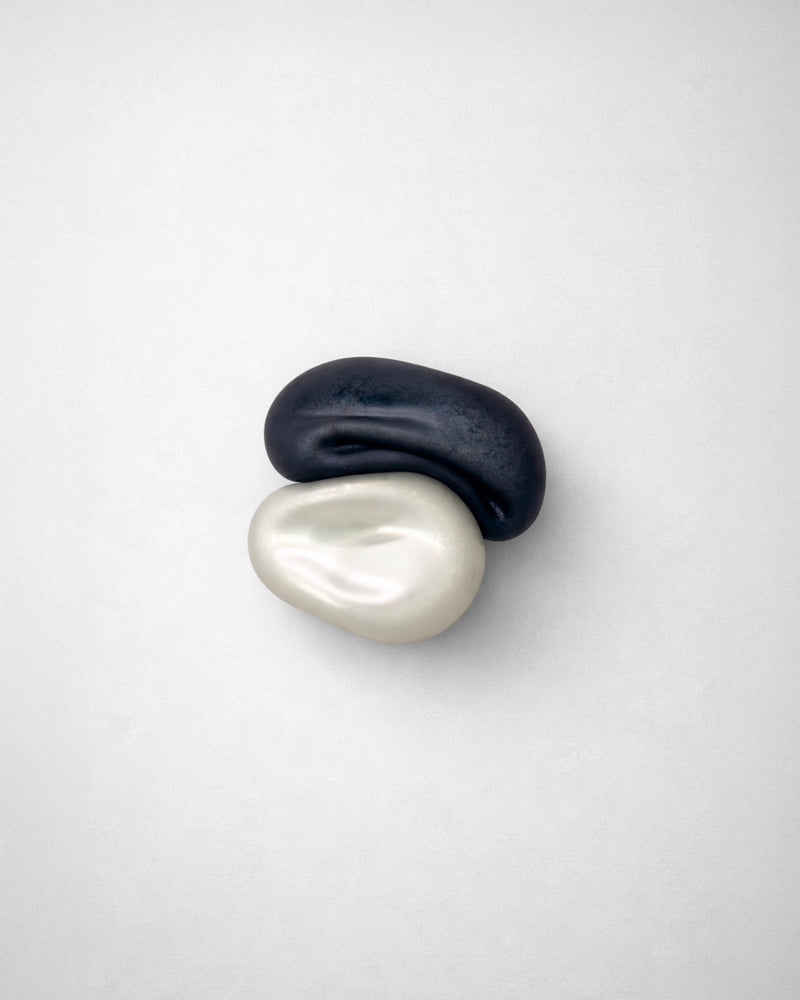 Nacre IX' Sculpture — close-up of black and white ceramic forms