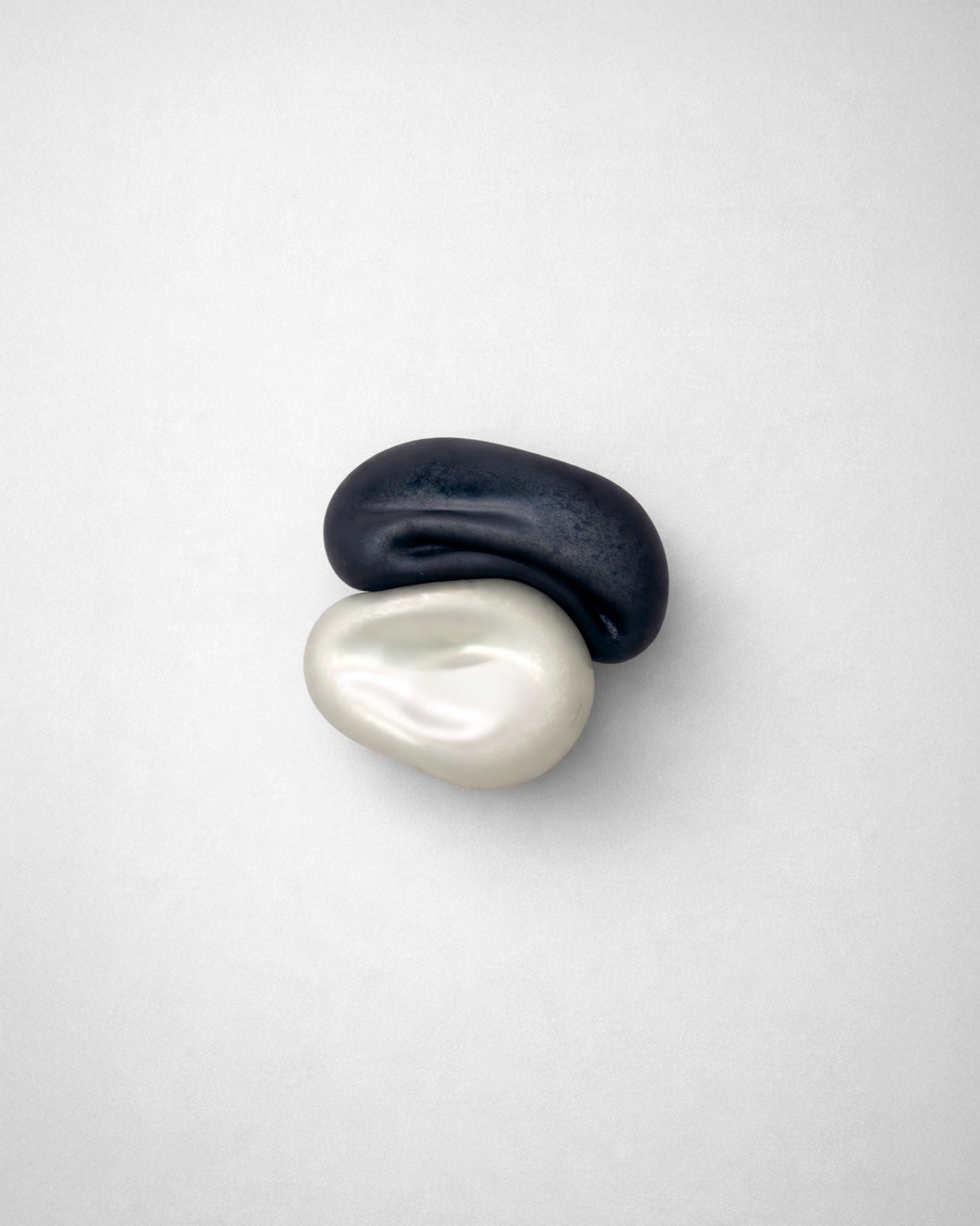 Nacre IX' Sculpture — close-up of black and white ceramic forms