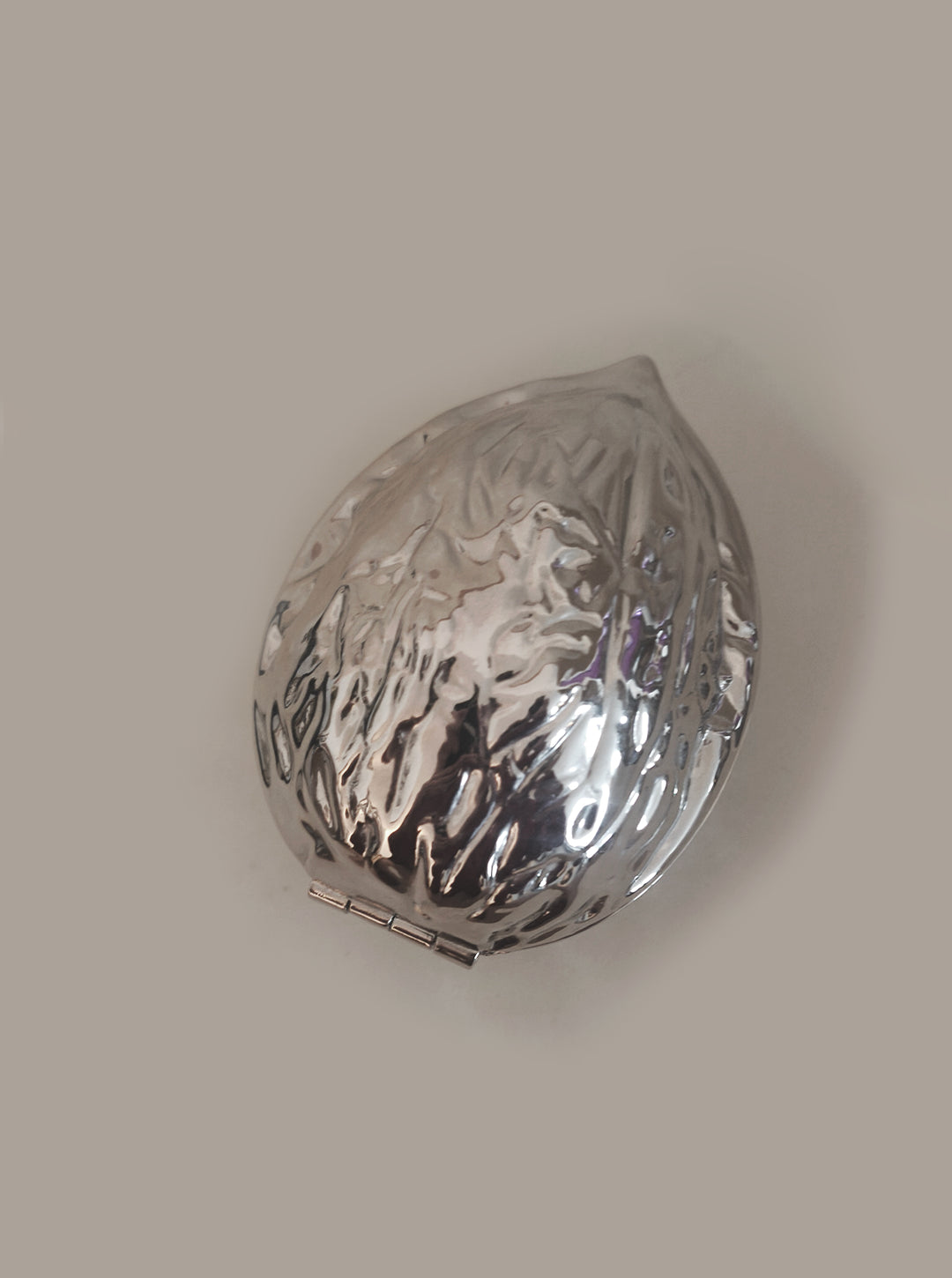 Stainless Steel Nutcracker — close-up of polished metallic surface