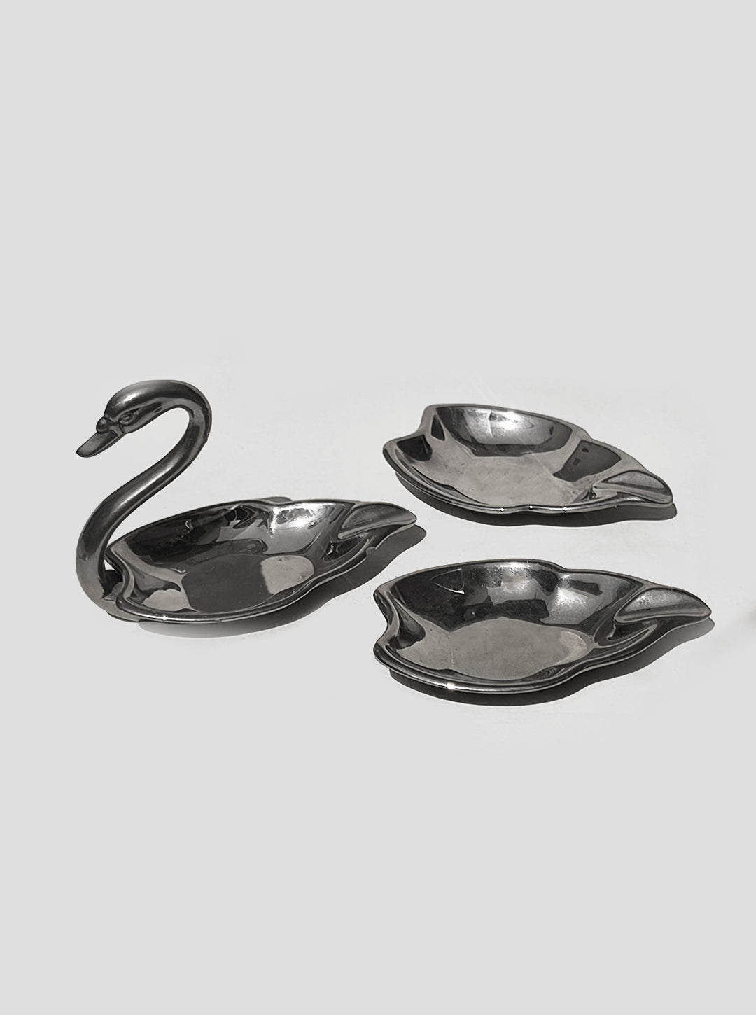 Set of Swan Ashtrays — lifestyle setting