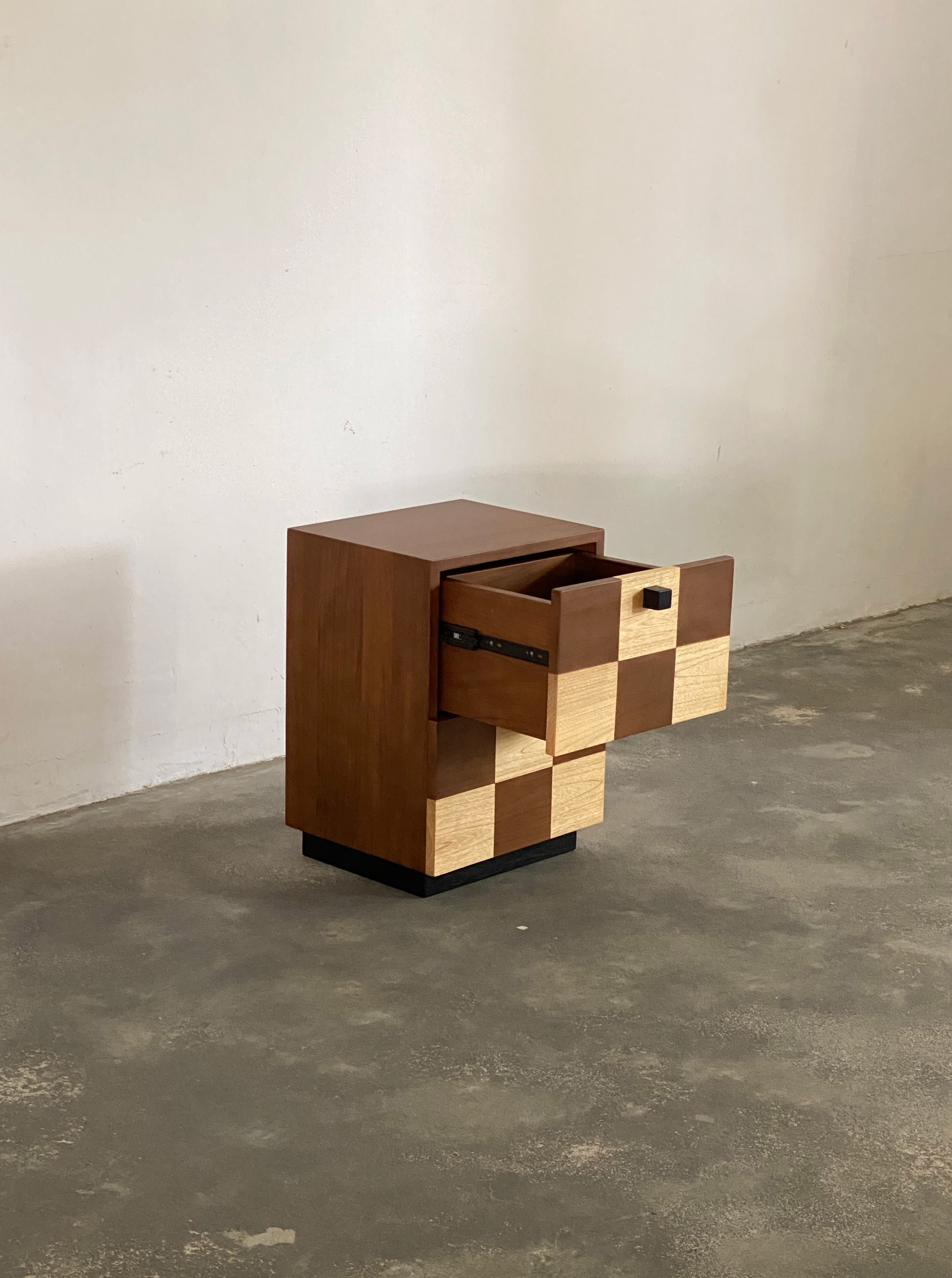 Coklat Night Stand — angled view with open drawers and wood textures