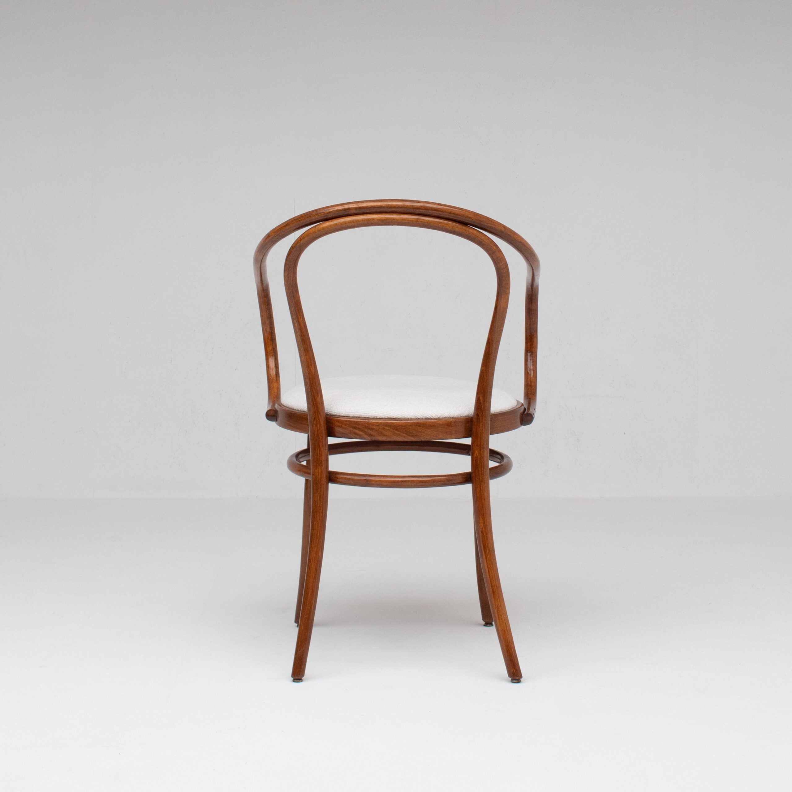 Set of Four Thonet Bentwood Armchairs in Walnut with Bouclé Upholstery — close-up
