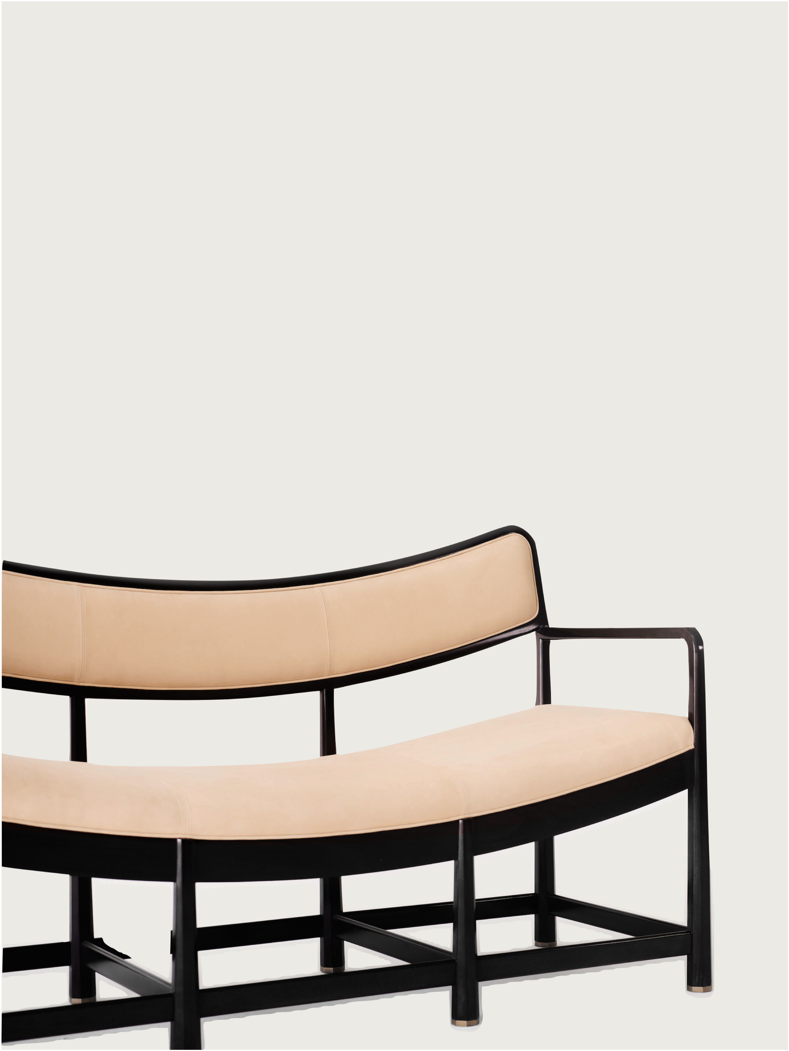 Daybed Sofa — side view with beige upholstery and black frame