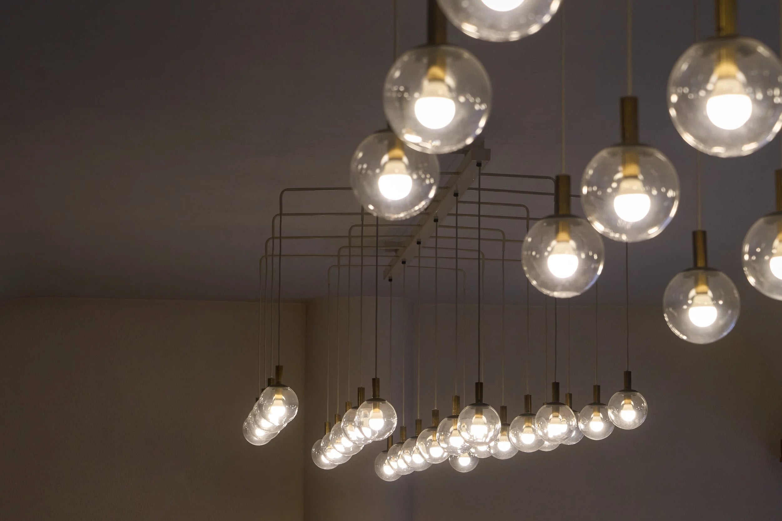 Monumental Pair of Mid-Century Chandeliers in Glass, Metal and Patinated Brass 1960, 1960 — side angle