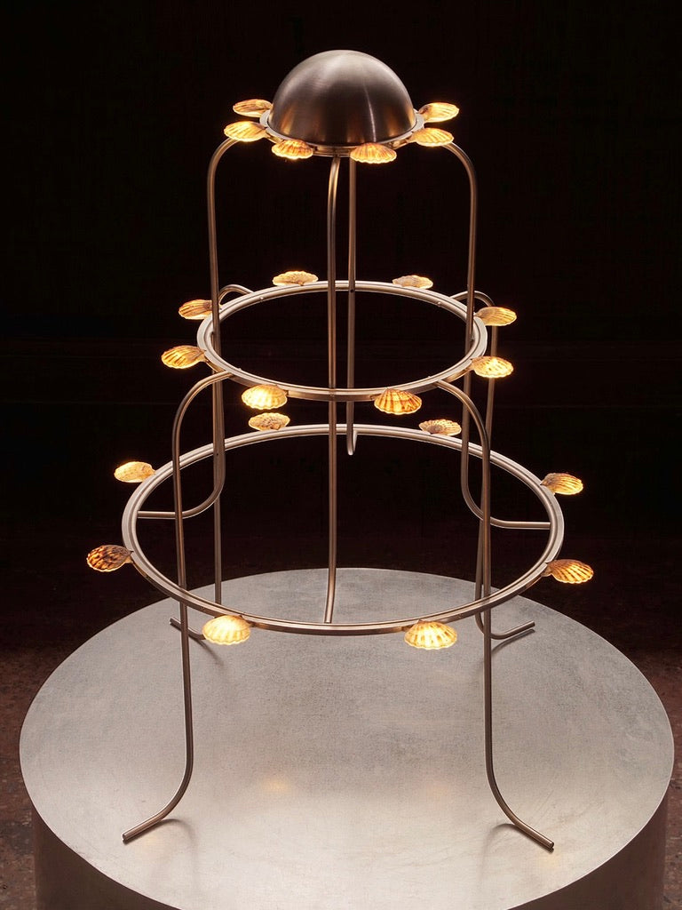 The Lamp With Shells — side view highlighting metal frame and shell lights