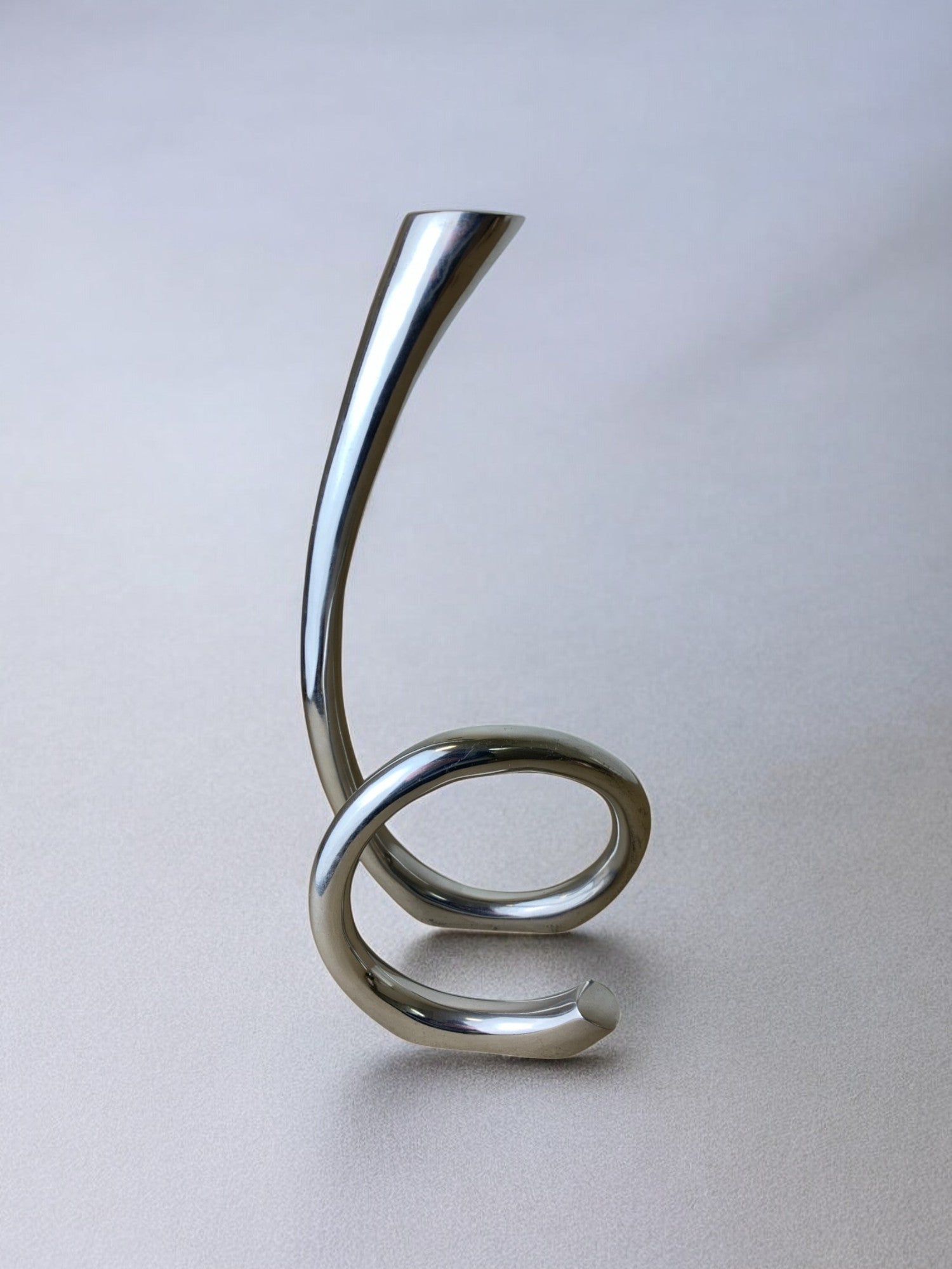 Biomorphic Candleholder, Solid Aluminum, Spain, circa 1970's — angled view on soft gray background
