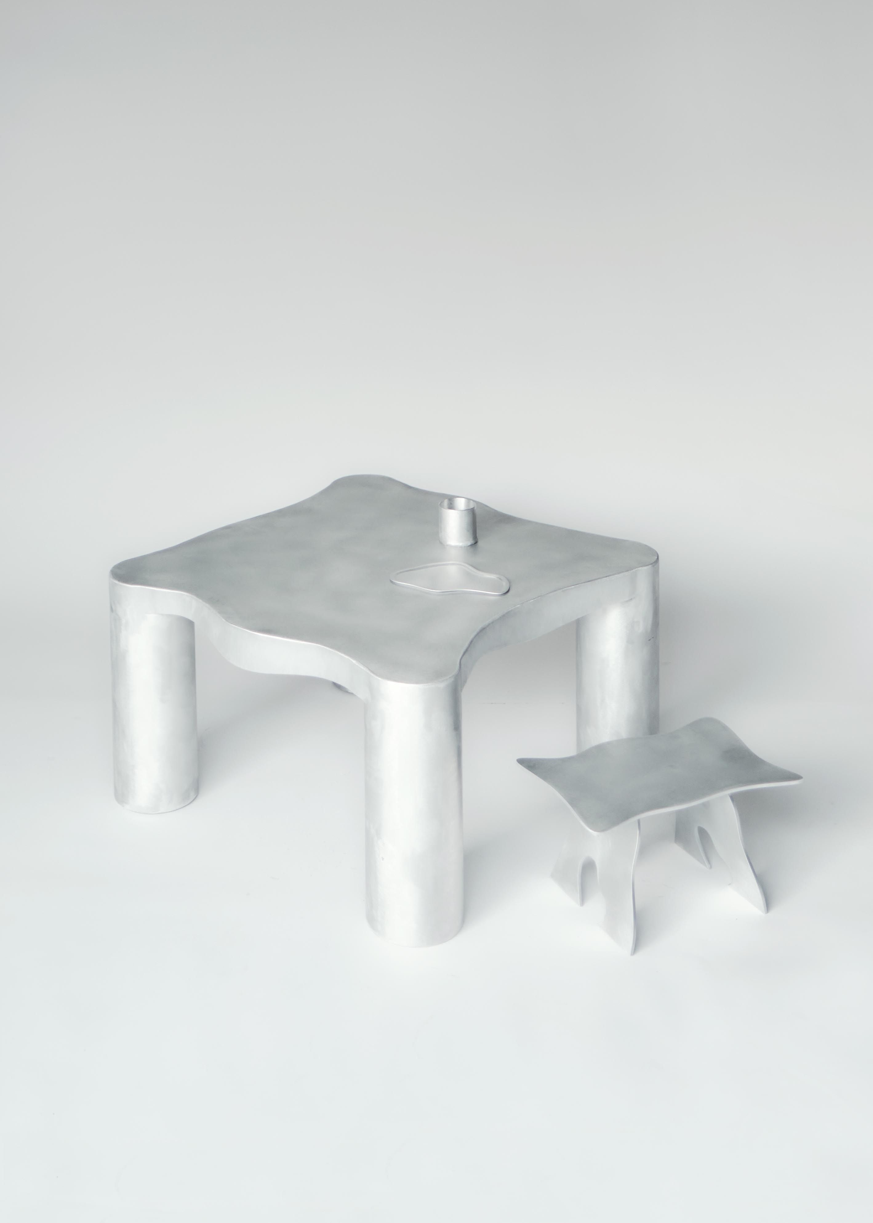 Contemporary Aluminium Coffee Table — side angle showing rounded edges and legs
