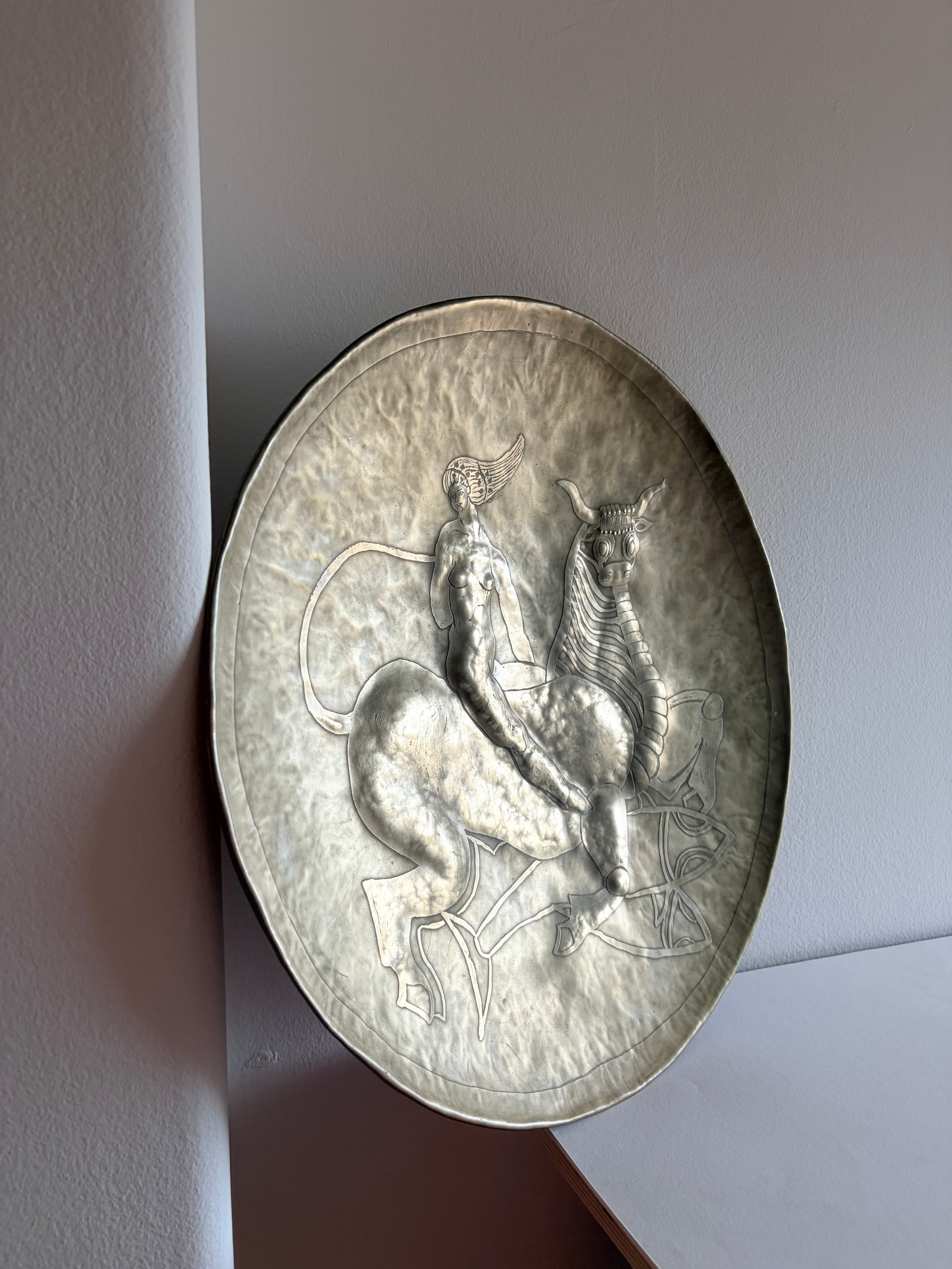 Brutalist large scale repousse wall plate, Spain, 1978 — side angle