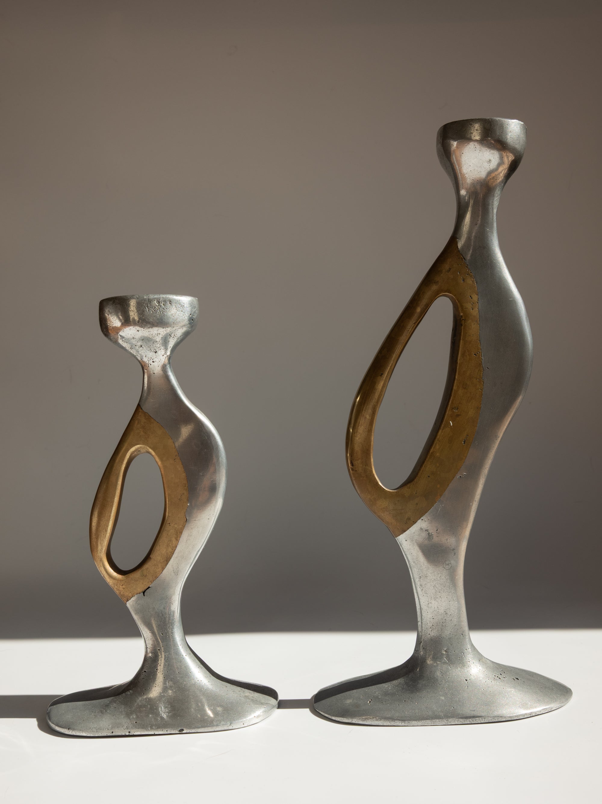 Brutalist Aluminium and Brass Candlesticks by Léopold - Spain, c. 1970s — lifestyle setting
